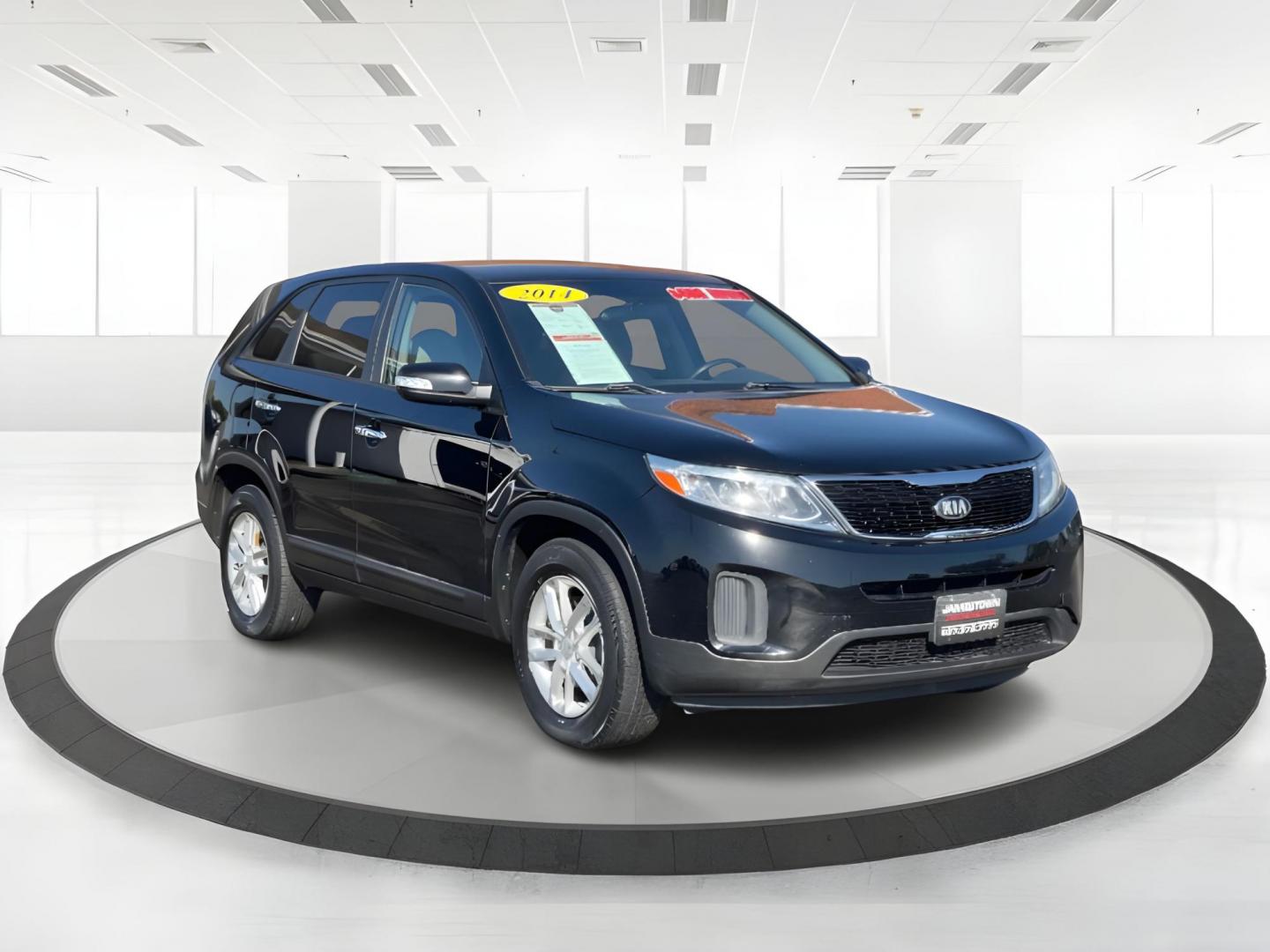 2014 Black Kia Sorento LX 2WD (5XYKT3A65EG) with an 2.4L L4 DOHC 16V engine, 6-Speed Automatic transmission, located at 1099 N County Rd 25A, OH, 45373, (937) 908-9800, 40.057079, -84.212883 - Photo#0