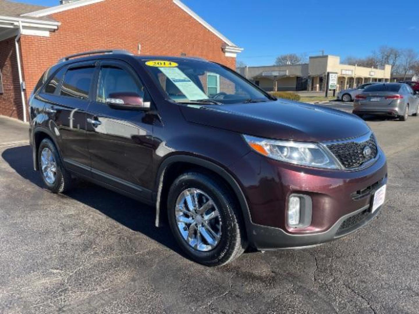 2014 Maroon Kia Sorento LX 2WD (5XYKT3A6XEG) with an 2.4L L4 DOHC 16V engine, 6-Speed Automatic transmission, located at 880 E. National Road, Vandalia, OH, 45377, (937) 908-9800, 39.892189, -84.181015 - Photo#0