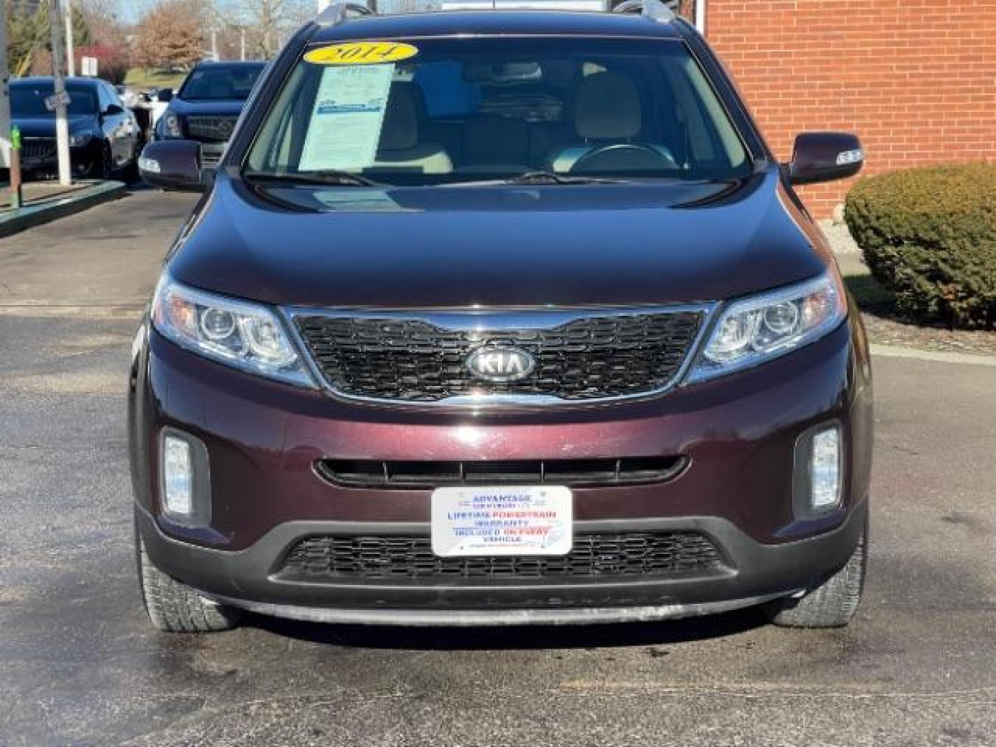 2014 Maroon Kia Sorento LX 2WD (5XYKT3A6XEG) with an 2.4L L4 DOHC 16V engine, 6-Speed Automatic transmission, located at 880 E. National Road, Vandalia, OH, 45377, (937) 908-9800, 39.892189, -84.181015 - Photo#5