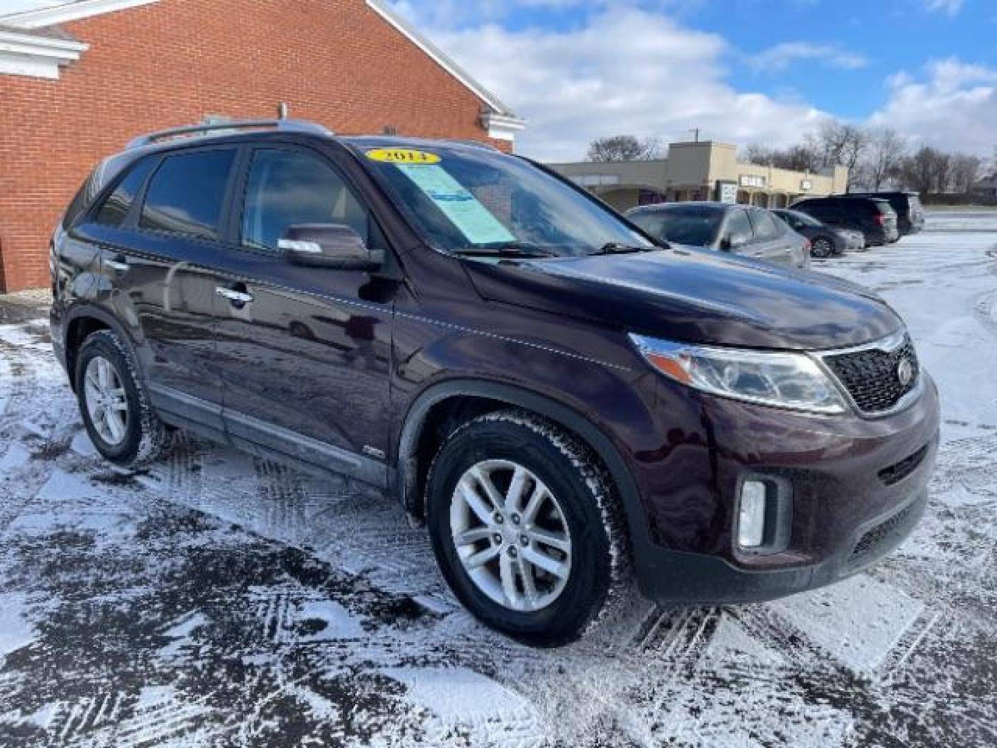 2014 Dark Cherry Kia Sorento LX AWD (5XYKTCA63EG) with an 2.4L L4 DOHC 16V engine, 6-Speed Automatic transmission, located at 1230 East Main St, Xenia, OH, 45385, (937) 908-9800, 39.687321, -83.910294 - Photo#0