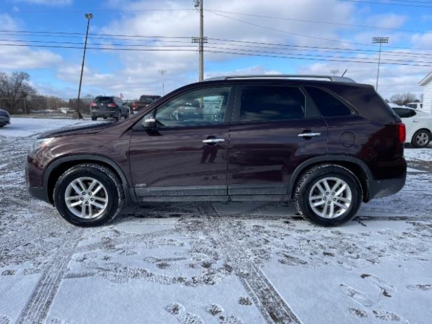 2014 Dark Cherry Kia Sorento LX AWD (5XYKTCA63EG) with an 2.4L L4 DOHC 16V engine, 6-Speed Automatic transmission, located at 1230 East Main St, Xenia, OH, 45385, (937) 908-9800, 39.687321, -83.910294 - Photo#2