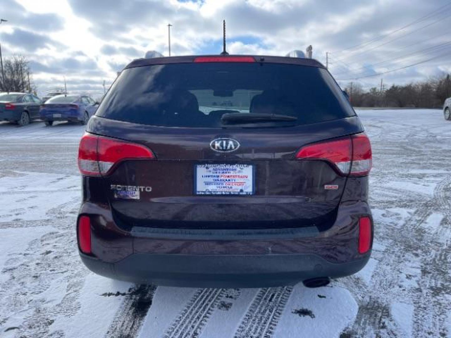 2014 Dark Cherry Kia Sorento LX AWD (5XYKTCA63EG) with an 2.4L L4 DOHC 16V engine, 6-Speed Automatic transmission, located at 1230 East Main St, Xenia, OH, 45385, (937) 908-9800, 39.687321, -83.910294 - Photo#4