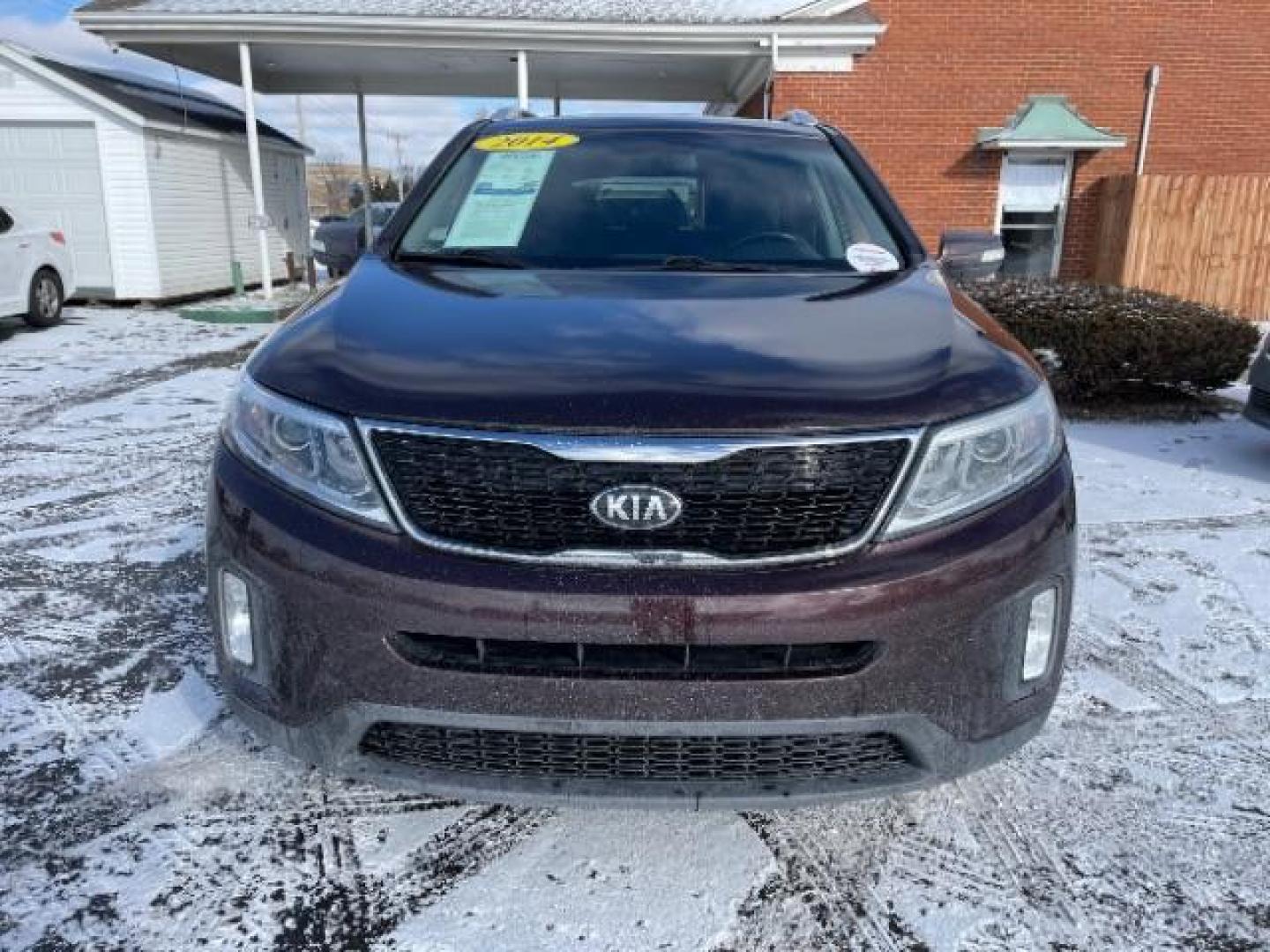 2014 Dark Cherry Kia Sorento LX AWD (5XYKTCA63EG) with an 2.4L L4 DOHC 16V engine, 6-Speed Automatic transmission, located at 1230 East Main St, Xenia, OH, 45385, (937) 908-9800, 39.687321, -83.910294 - Photo#5