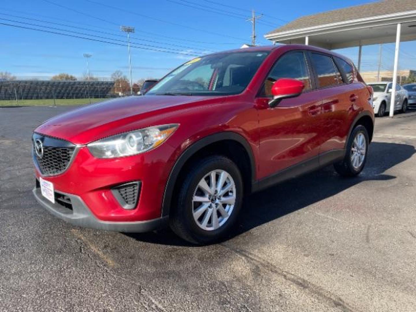 2014 Soul Red Metallic Mazda CX-5 Sport AT (JM3KE2BE7E0) with an 2.0L L4 DOHC 16V engine, 6-Speed Automatic transmission, located at 1230 East Main St, Xenia, OH, 45385, (937) 908-9800, 39.687321, -83.910294 - Photo#1