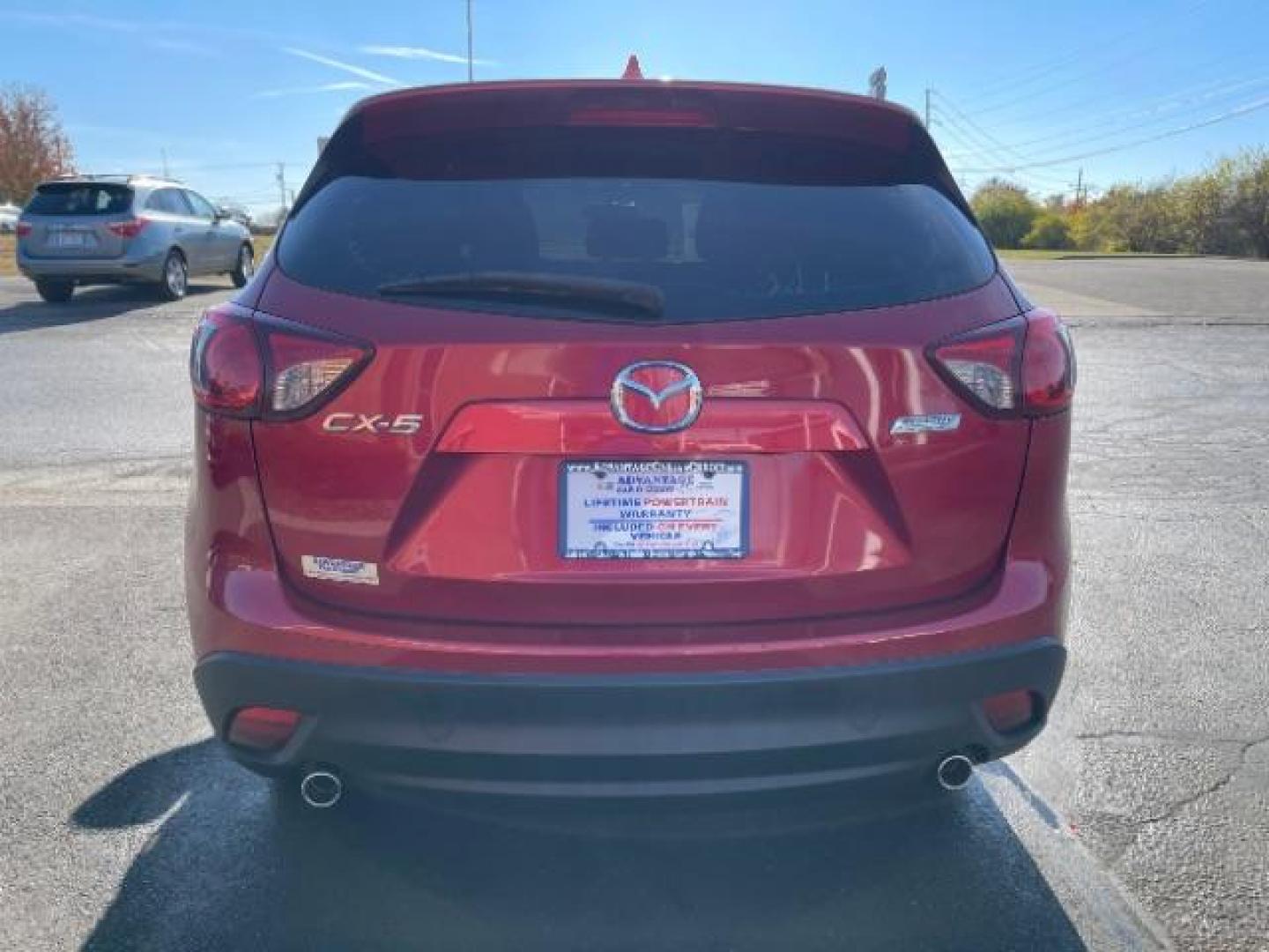 2014 Soul Red Metallic Mazda CX-5 Sport AT (JM3KE2BE7E0) with an 2.0L L4 DOHC 16V engine, 6-Speed Automatic transmission, located at 1230 East Main St, Xenia, OH, 45385, (937) 908-9800, 39.687321, -83.910294 - Photo#3