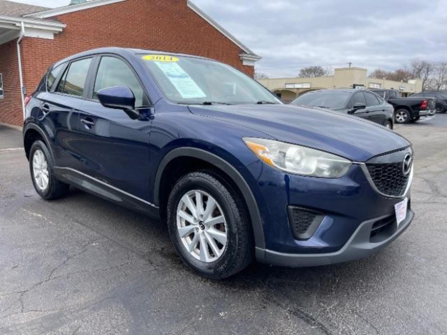 2014 Stormy Blue Mica Mazda CX-5 Sport AWD (JM3KE4BE9E0) with an 2.5L L4 DOHC 16V engine, 6-Speed Automatic transmission, located at 1951 S Dayton Lakeview Rd., New Carlisle, OH, 45344, (937) 908-9800, 39.890999, -84.050255 - Photo#0