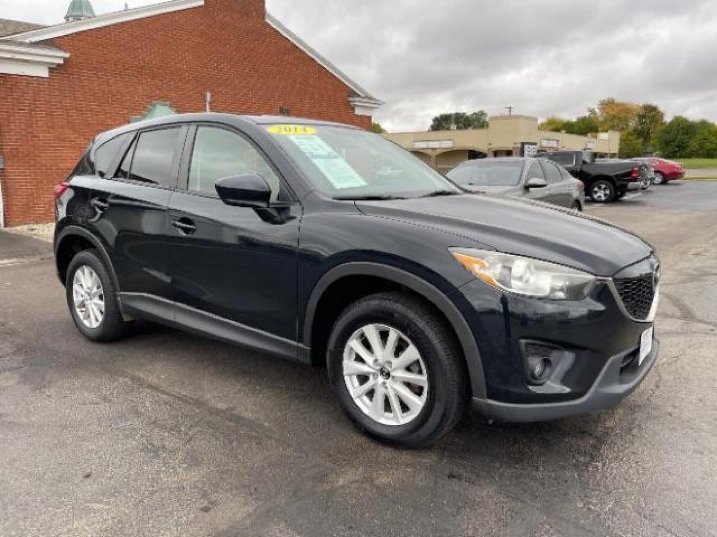 2014 Jet Black Mica Mazda CX-5 Touring AWD (JM3KE4CY2E0) with an 2.5L L4 DOHC 16V engine, 6-Speed Automatic transmission, located at 1230 East Main St, Xenia, OH, 45385, (937) 908-9800, 39.687321, -83.910294 - Photo#0