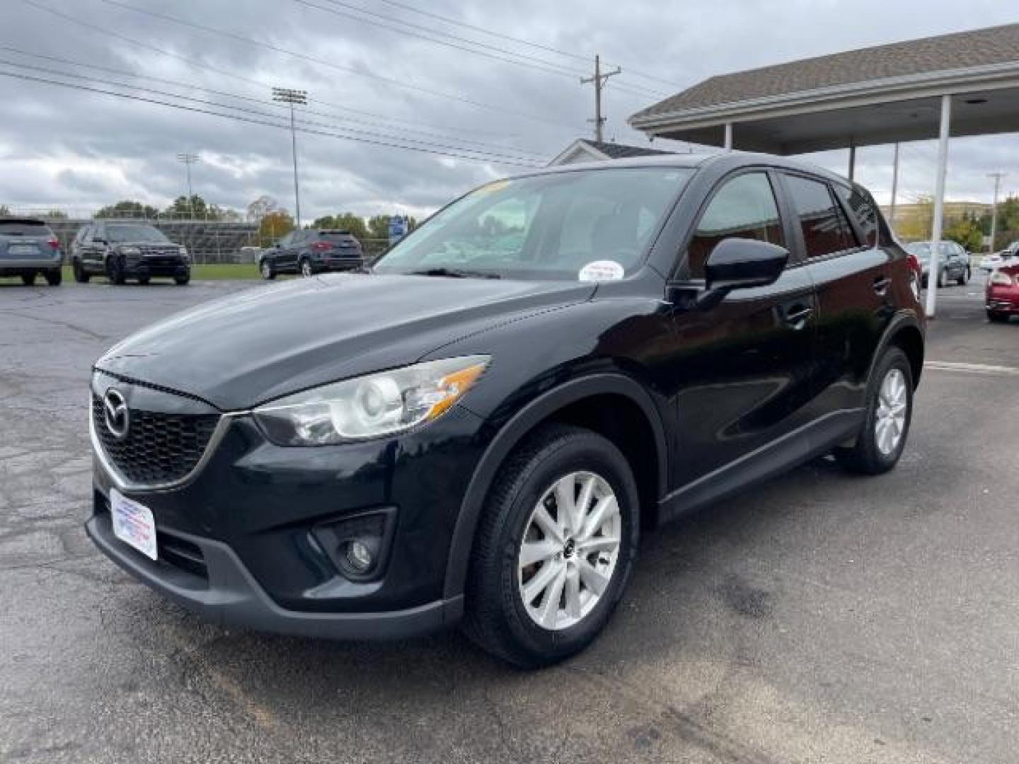 2014 Jet Black Mica Mazda CX-5 Touring AWD (JM3KE4CY2E0) with an 2.5L L4 DOHC 16V engine, 6-Speed Automatic transmission, located at 1230 East Main St, Xenia, OH, 45385, (937) 908-9800, 39.687321, -83.910294 - Photo#1