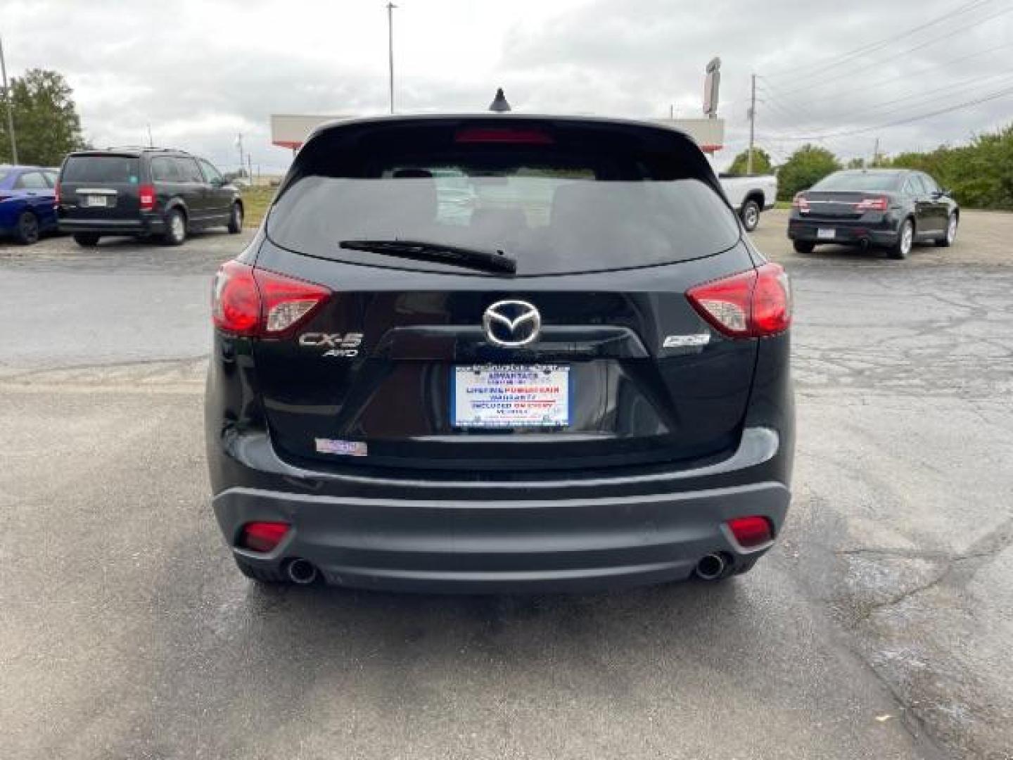 2014 Jet Black Mica Mazda CX-5 Touring AWD (JM3KE4CY2E0) with an 2.5L L4 DOHC 16V engine, 6-Speed Automatic transmission, located at 1230 East Main St, Xenia, OH, 45385, (937) 908-9800, 39.687321, -83.910294 - Photo#3