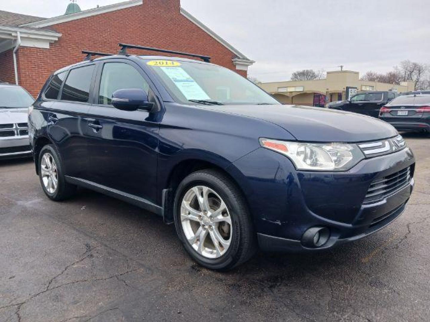 2014 Cosmic Blue Metallic Mitsubishi Outlander SE S-AWC (JA4AZ3A32EZ) with an 2.4L L4 DOHC 16V engine, 6-Speed Automatic transmission, located at 880 E. National Road, Vandalia, OH, 45377, (937) 908-9800, 39.892189, -84.181015 - Photo#0