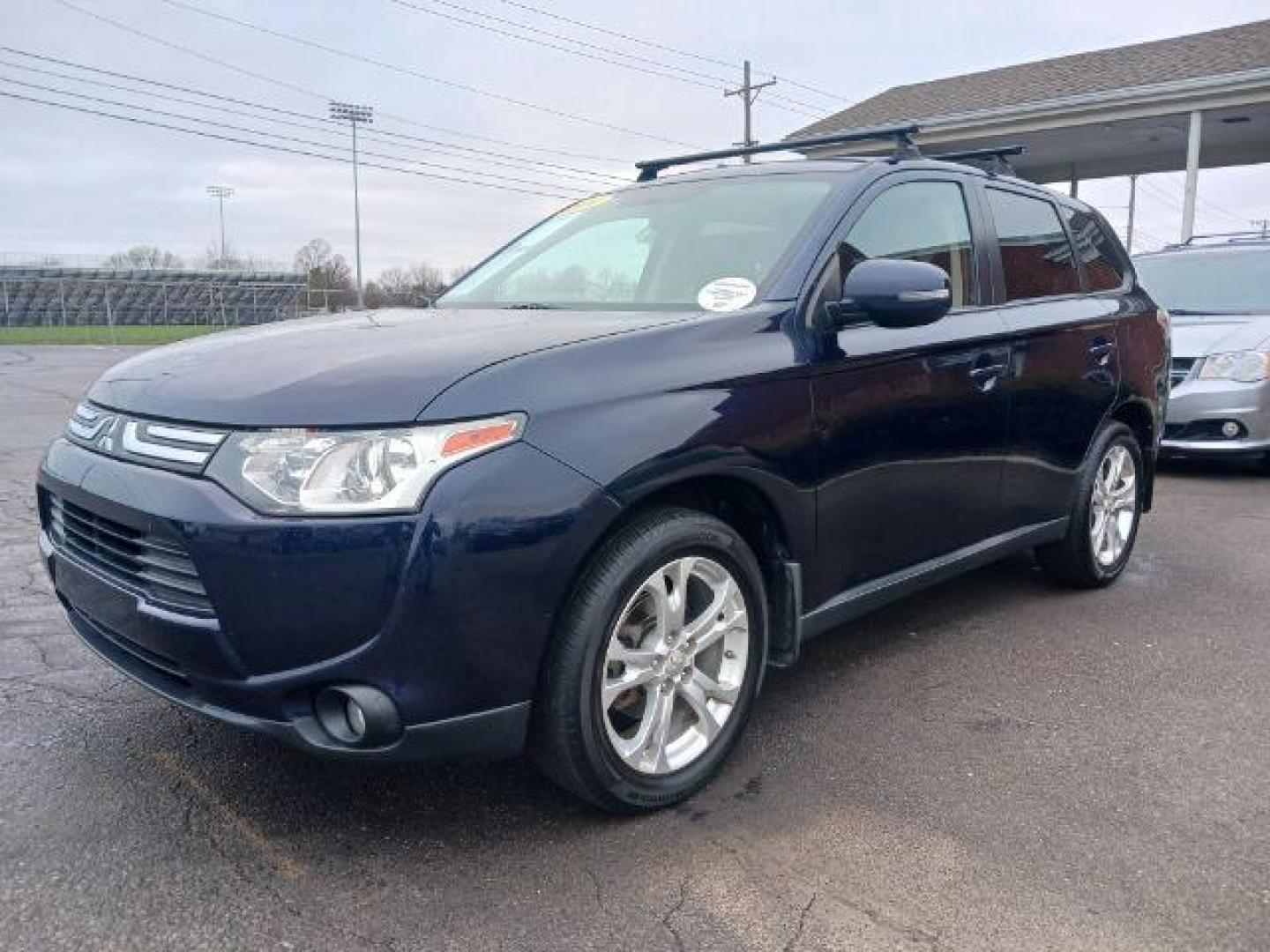 2014 Cosmic Blue Metallic Mitsubishi Outlander SE S-AWC (JA4AZ3A32EZ) with an 2.4L L4 DOHC 16V engine, 6-Speed Automatic transmission, located at 880 E. National Road, Vandalia, OH, 45377, (937) 908-9800, 39.892189, -84.181015 - Photo#2