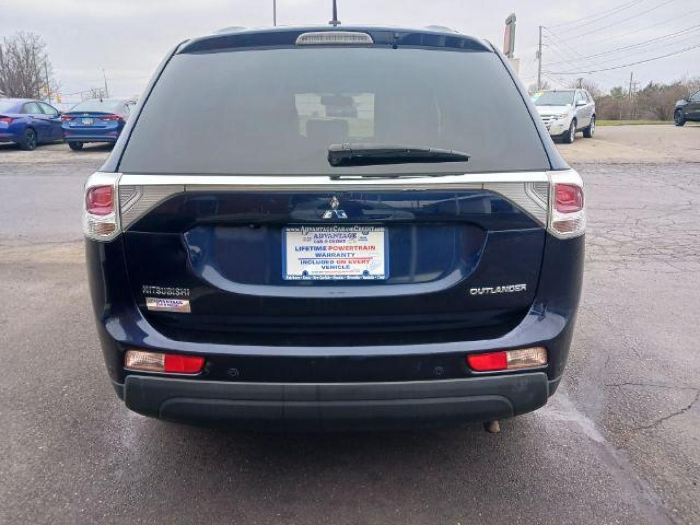 2014 Cosmic Blue Metallic Mitsubishi Outlander SE S-AWC (JA4AZ3A32EZ) with an 2.4L L4 DOHC 16V engine, 6-Speed Automatic transmission, located at 880 E. National Road, Vandalia, OH, 45377, (937) 908-9800, 39.892189, -84.181015 - Photo#5