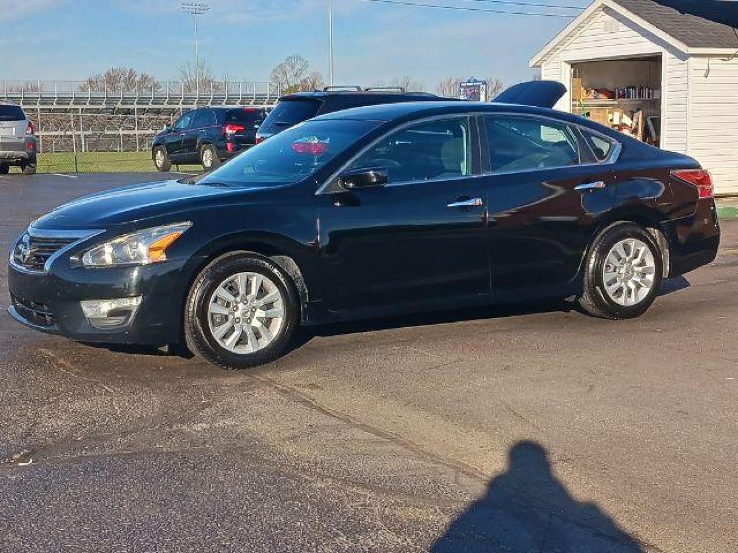 2014 Super Black Nissan Altima 2.5 S (1N4AL3AP8EC) with an 2.5L L4 DOHC 16V engine, Continuously Variable Transmission transmission, located at 880 E. National Road, Vandalia, OH, 45377, (937) 908-9800, 39.892189, -84.181015 - Photo#2