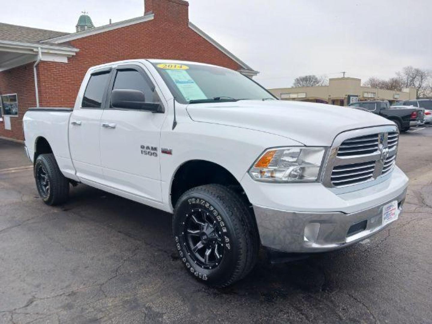 2014 Bright White Clearcoat RAM 1500 SLT Quad Cab 4WD (1C6RR7GT9ES) with an 5.7L V8 OHV 16V engine, 8-Speed Automatic transmission, located at 1184 Kauffman Ave, Fairborn, OH, 45324, (937) 908-9800, 39.807365, -84.029114 - Photo#0