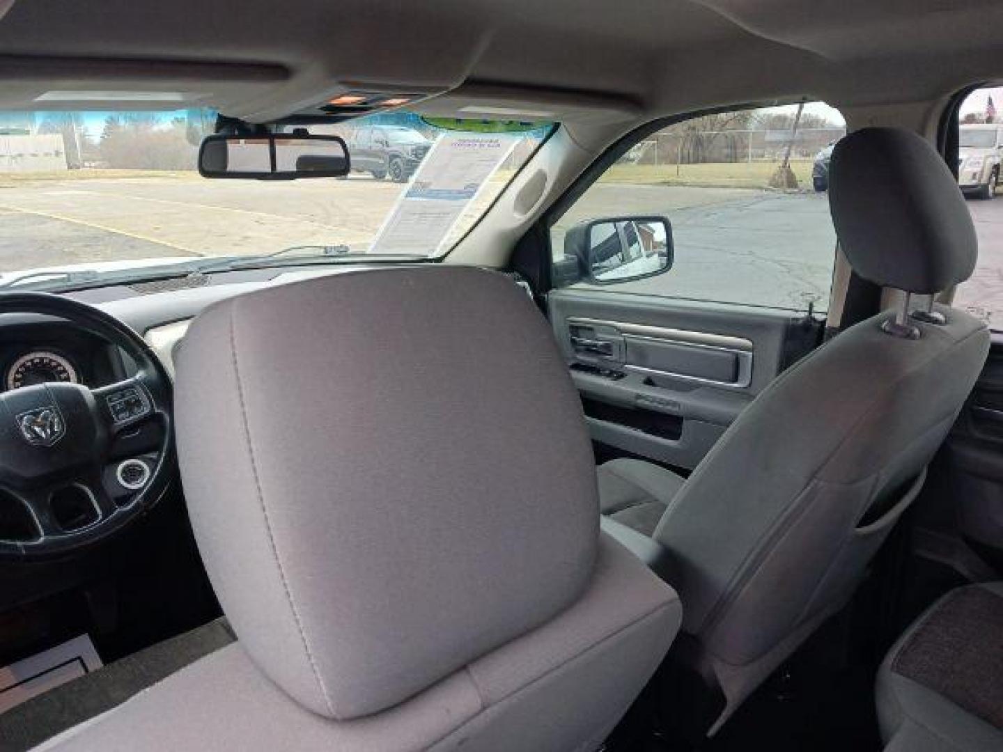 2014 Bright White Clearcoat RAM 1500 SLT Quad Cab 4WD (1C6RR7GT9ES) with an 5.7L V8 OHV 16V engine, 8-Speed Automatic transmission, located at 1184 Kauffman Ave, Fairborn, OH, 45324, (937) 908-9800, 39.807365, -84.029114 - Photo#9