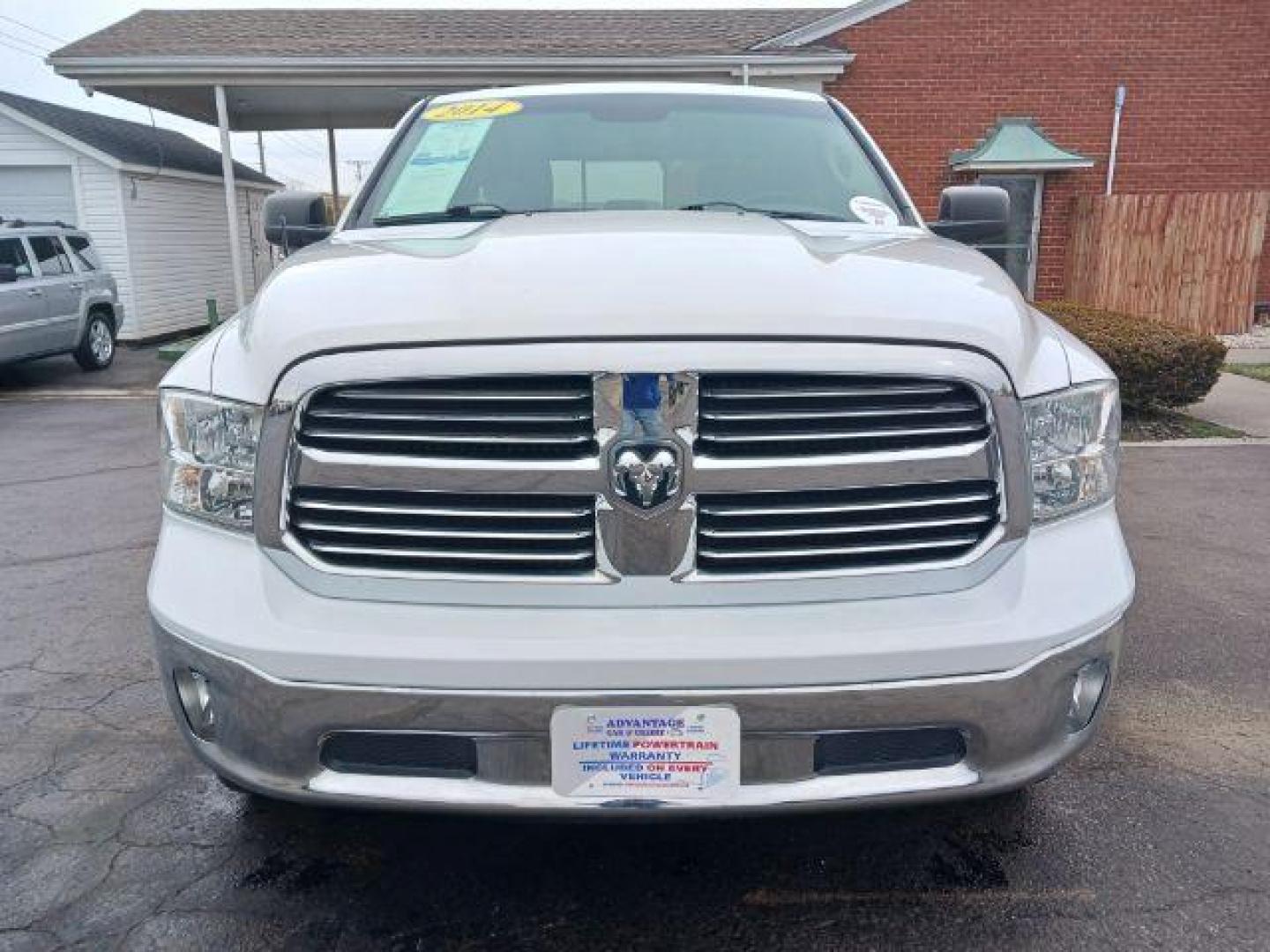 2014 Bright White Clearcoat RAM 1500 SLT Quad Cab 4WD (1C6RR7GT9ES) with an 5.7L V8 OHV 16V engine, 8-Speed Automatic transmission, located at 1184 Kauffman Ave, Fairborn, OH, 45324, (937) 908-9800, 39.807365, -84.029114 - Photo#1