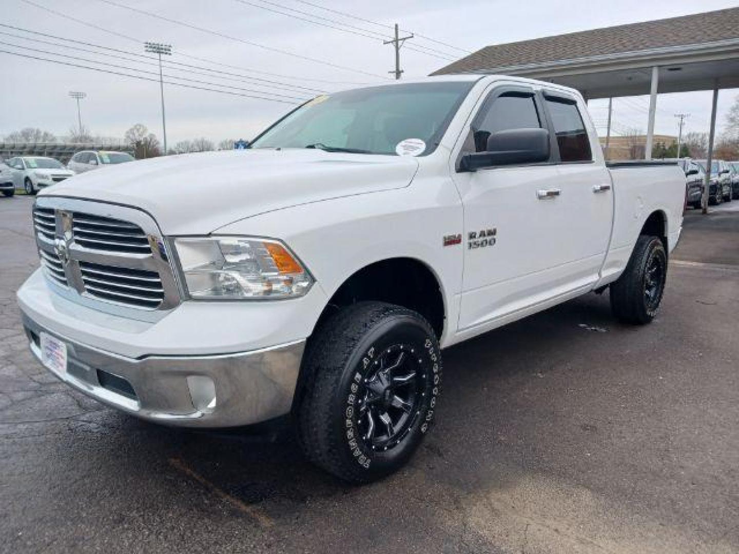 2014 Bright White Clearcoat RAM 1500 SLT Quad Cab 4WD (1C6RR7GT9ES) with an 5.7L V8 OHV 16V engine, 8-Speed Automatic transmission, located at 1184 Kauffman Ave, Fairborn, OH, 45324, (937) 908-9800, 39.807365, -84.029114 - Photo#2