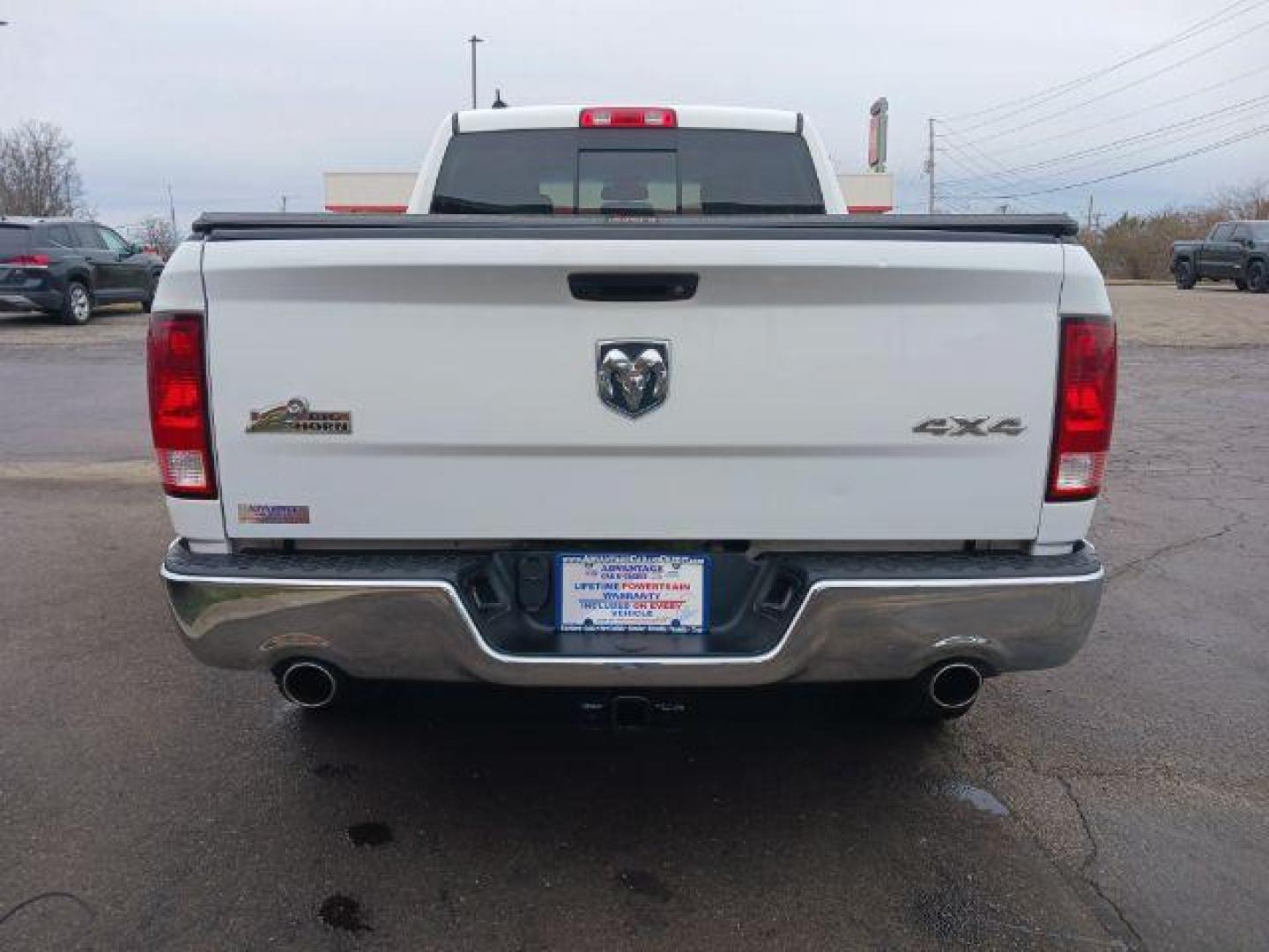 2014 Bright White Clearcoat RAM 1500 SLT Quad Cab 4WD (1C6RR7GT9ES) with an 5.7L V8 OHV 16V engine, 8-Speed Automatic transmission, located at 1184 Kauffman Ave, Fairborn, OH, 45324, (937) 908-9800, 39.807365, -84.029114 - Photo#5