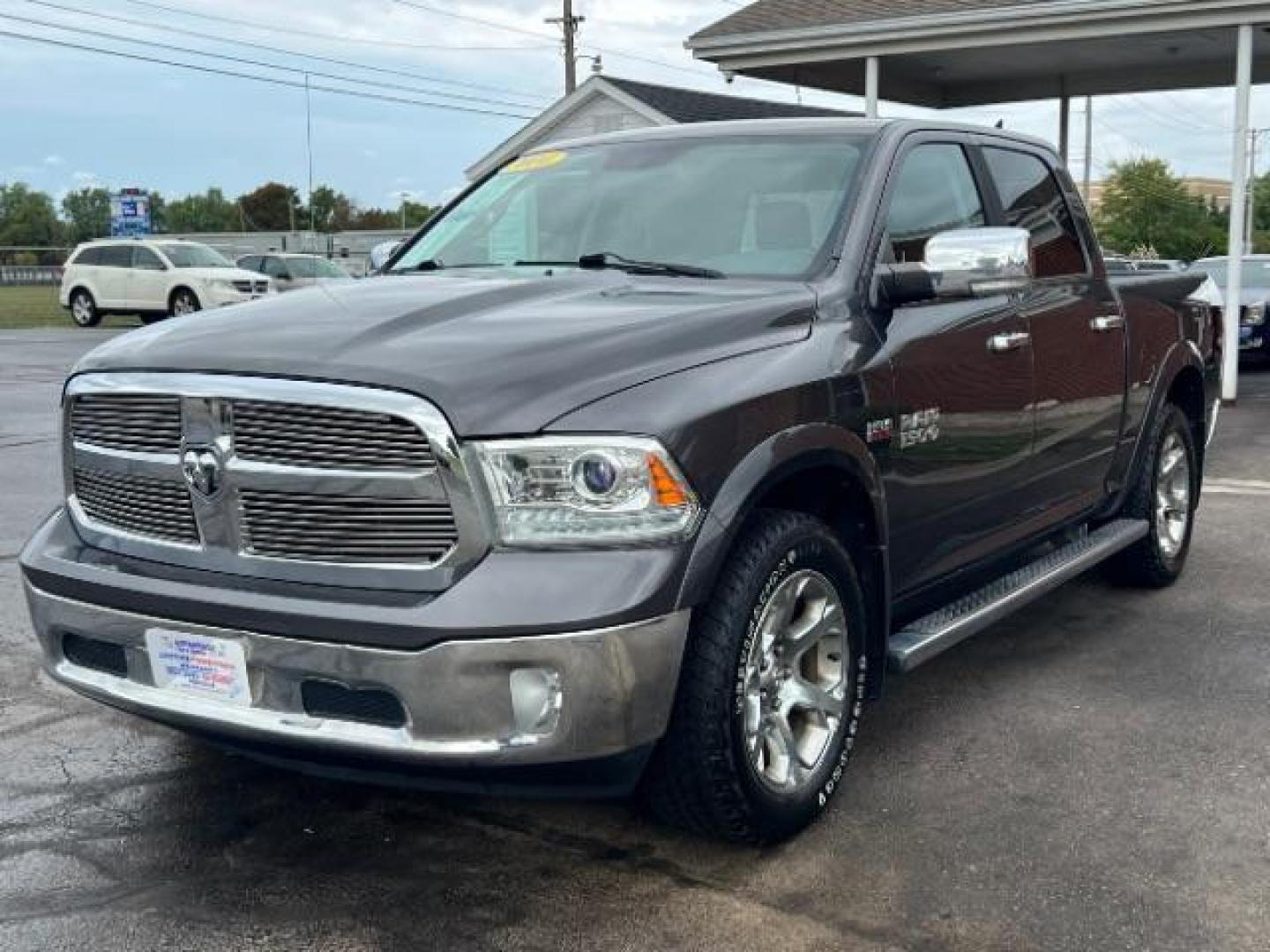 2014 Granite Crystal Met CC RAM 1500 Laramie Crew Cab SWB 4WD (1C6RR7NTXES) with an 5.7L V8 OHV 16V engine, 8-Speed Automatic transmission, located at 1951 S Dayton Lakeview Rd., New Carlisle, OH, 45344, (937) 908-9800, 39.890999, -84.050255 - Photo#2