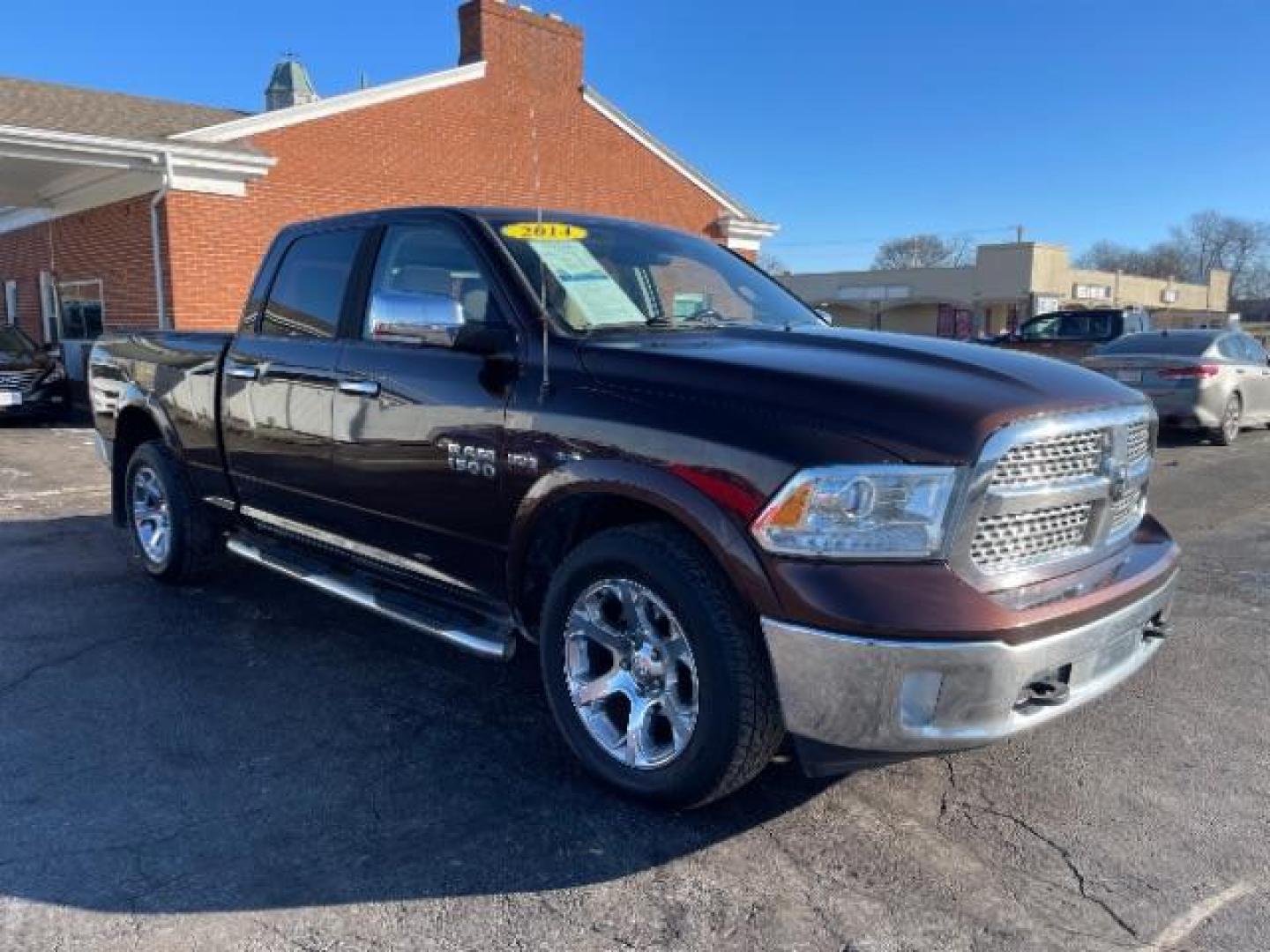 2014 Western Brown RAM 1500 Laramie Crew Cab LWB 4WD (1C6RR7VT1ES) with an 5.7L V8 OHV 16V engine, 8-Speed Automatic transmission, located at 1099 N County Rd 25A, OH, 45373, (937) 908-9800, 40.057079, -84.212883 - Photo#0