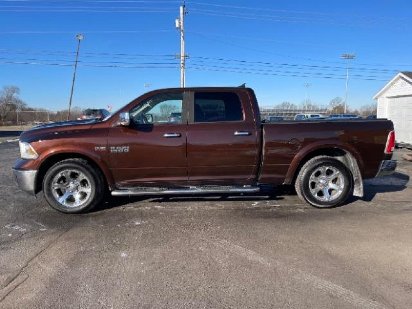 2014 Western Brown RAM 1500 Laramie Crew Cab LWB 4WD (1C6RR7VT1ES) with an 5.7L V8 OHV 16V engine, 8-Speed Automatic transmission, located at 1099 N County Rd 25A, OH, 45373, (937) 908-9800, 40.057079, -84.212883 - Photo#2