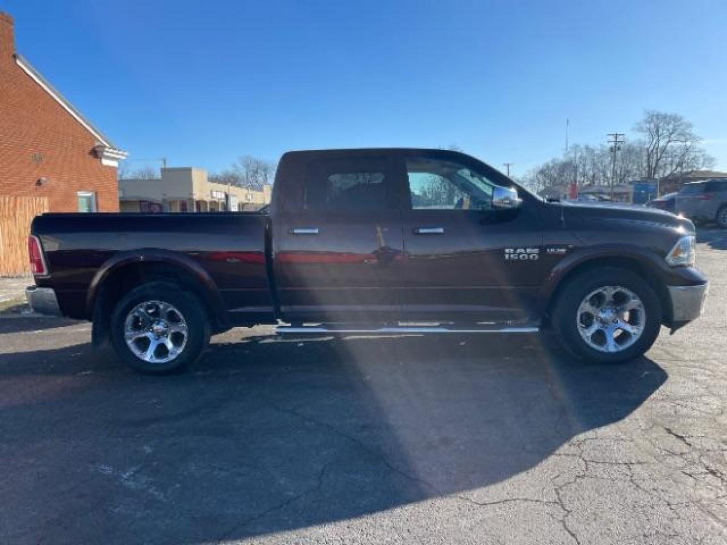 2014 Western Brown RAM 1500 Laramie Crew Cab LWB 4WD (1C6RR7VT1ES) with an 5.7L V8 OHV 16V engine, 8-Speed Automatic transmission, located at 1099 N County Rd 25A, OH, 45373, (937) 908-9800, 40.057079, -84.212883 - Photo#3