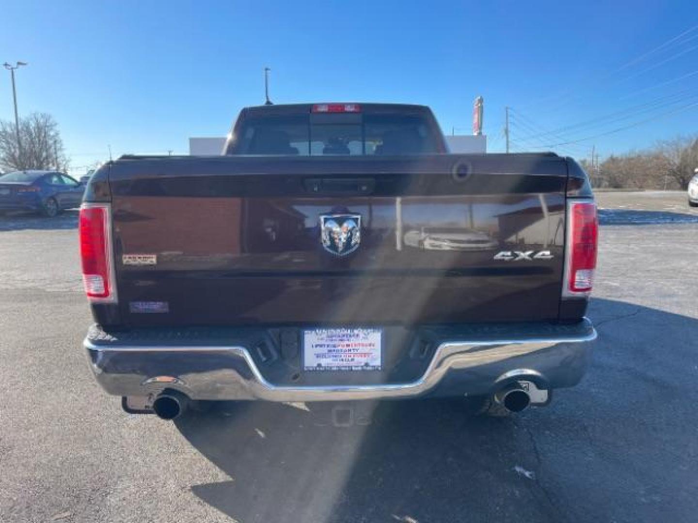 2014 Western Brown RAM 1500 Laramie Crew Cab LWB 4WD (1C6RR7VT1ES) with an 5.7L V8 OHV 16V engine, 8-Speed Automatic transmission, located at 1099 N County Rd 25A, OH, 45373, (937) 908-9800, 40.057079, -84.212883 - Photo#4