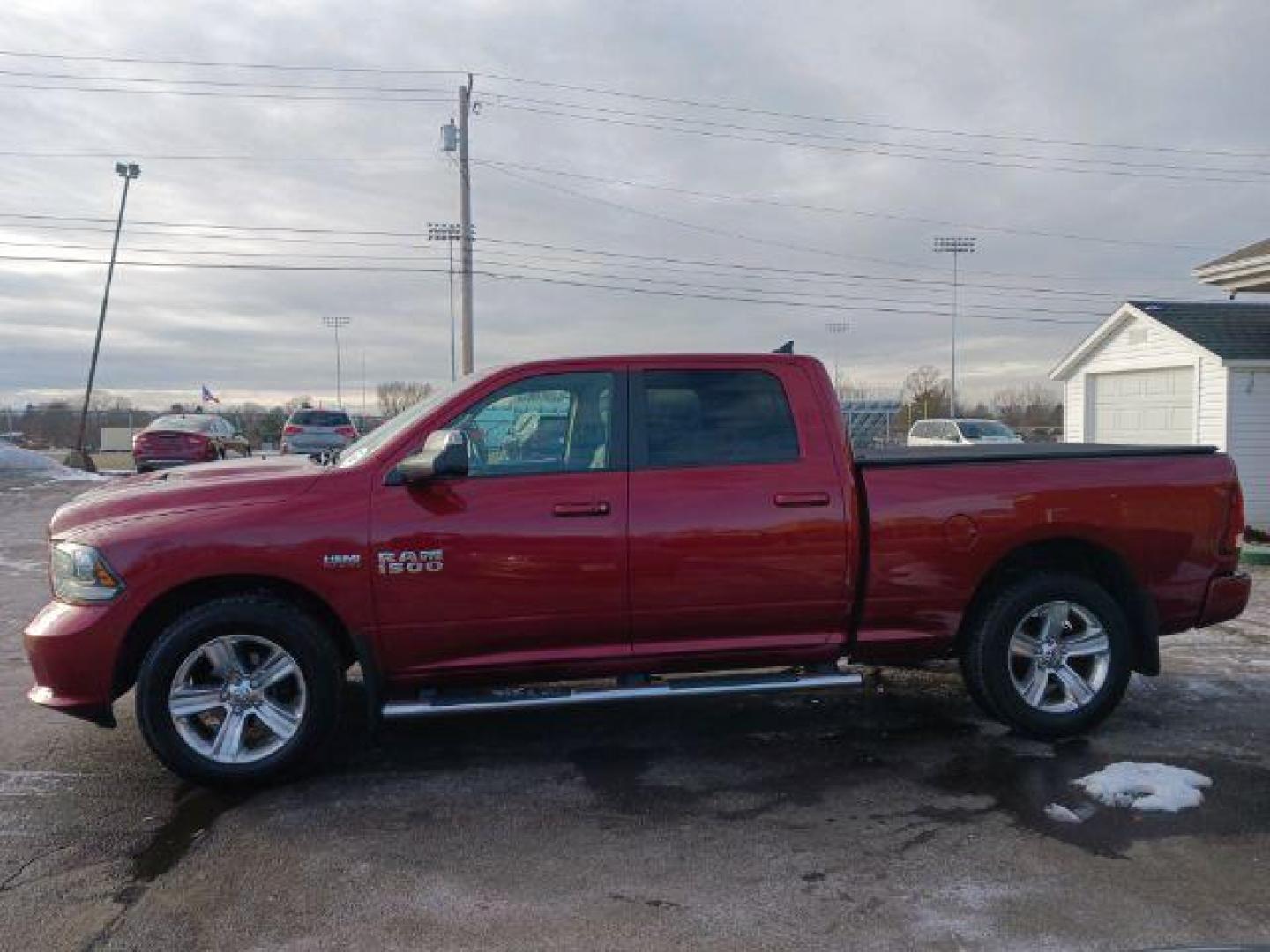 2014 Dp Cherry Red Crystal PC RAM 1500 Sport Crew Cab LWB 4WD (1C6RR7UT5ES) with an 5.7L V8 OHV 16V engine, 8-Speed Automatic transmission, located at 1230 East Main St, Xenia, OH, 45385, (937) 908-9800, 39.687321, -83.910294 - Photo#3