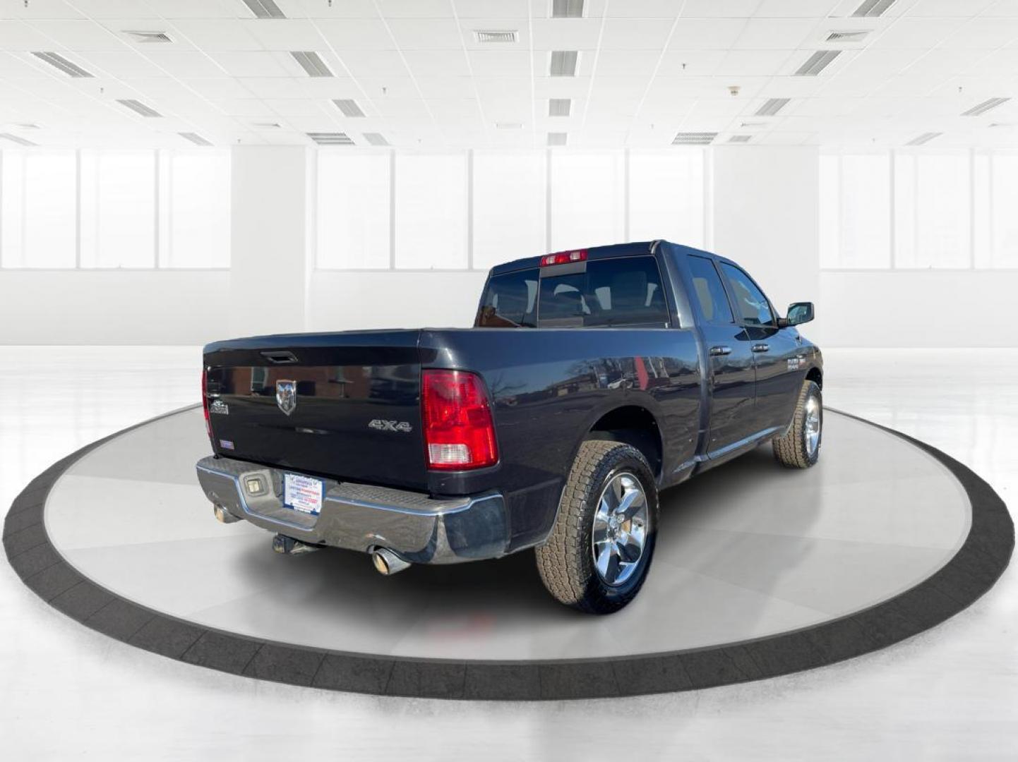 2014 Ram 1500 SLT Quad Cab 4WD (1C6RR7GT7ES) with an 5.7L V8 OHV 16V engine, 8-Speed Automatic transmission, located at 1230 East Main St, Xenia, OH, 45385, (937) 908-9800, 39.688026, -83.910172 - 2014 Ram 1500 SLT Quad Cab 4WD - Photo#2