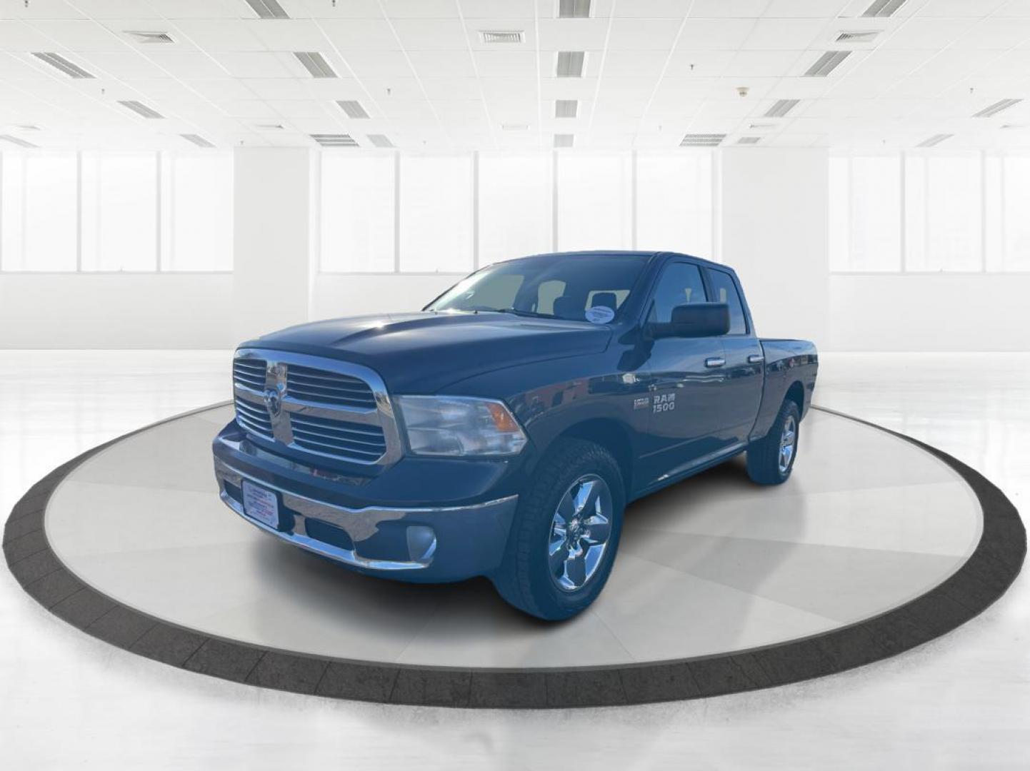 2014 Ram 1500 SLT Quad Cab 4WD (1C6RR7GT7ES) with an 5.7L V8 OHV 16V engine, 8-Speed Automatic transmission, located at 1230 East Main St, Xenia, OH, 45385, (937) 908-9800, 39.688026, -83.910172 - 2014 Ram 1500 SLT Quad Cab 4WD - Photo#7