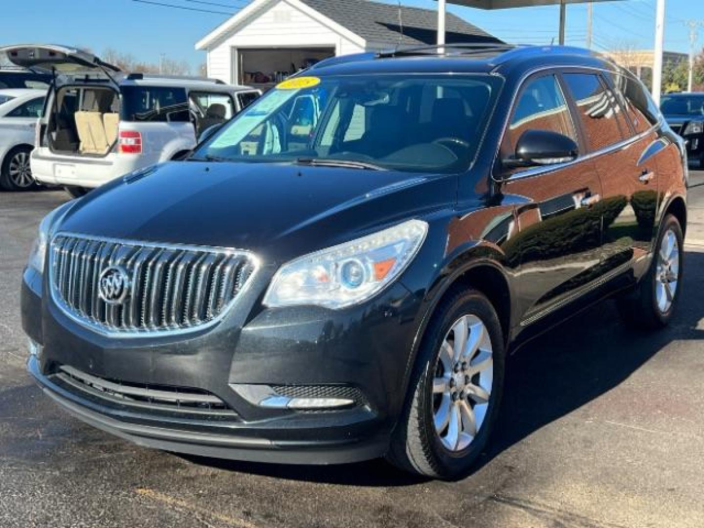 2015 Carbon Black Metallic Buick Enclave Premium FWD (5GAKRCKD4FJ) with an 3.6L V6 DOHC 24V engine, 6-Speed Automatic Overdrive transmission, located at 1099 N County Rd 25A, OH, 45373, (937) 908-9800, 40.057079, -84.212883 - Photo#2