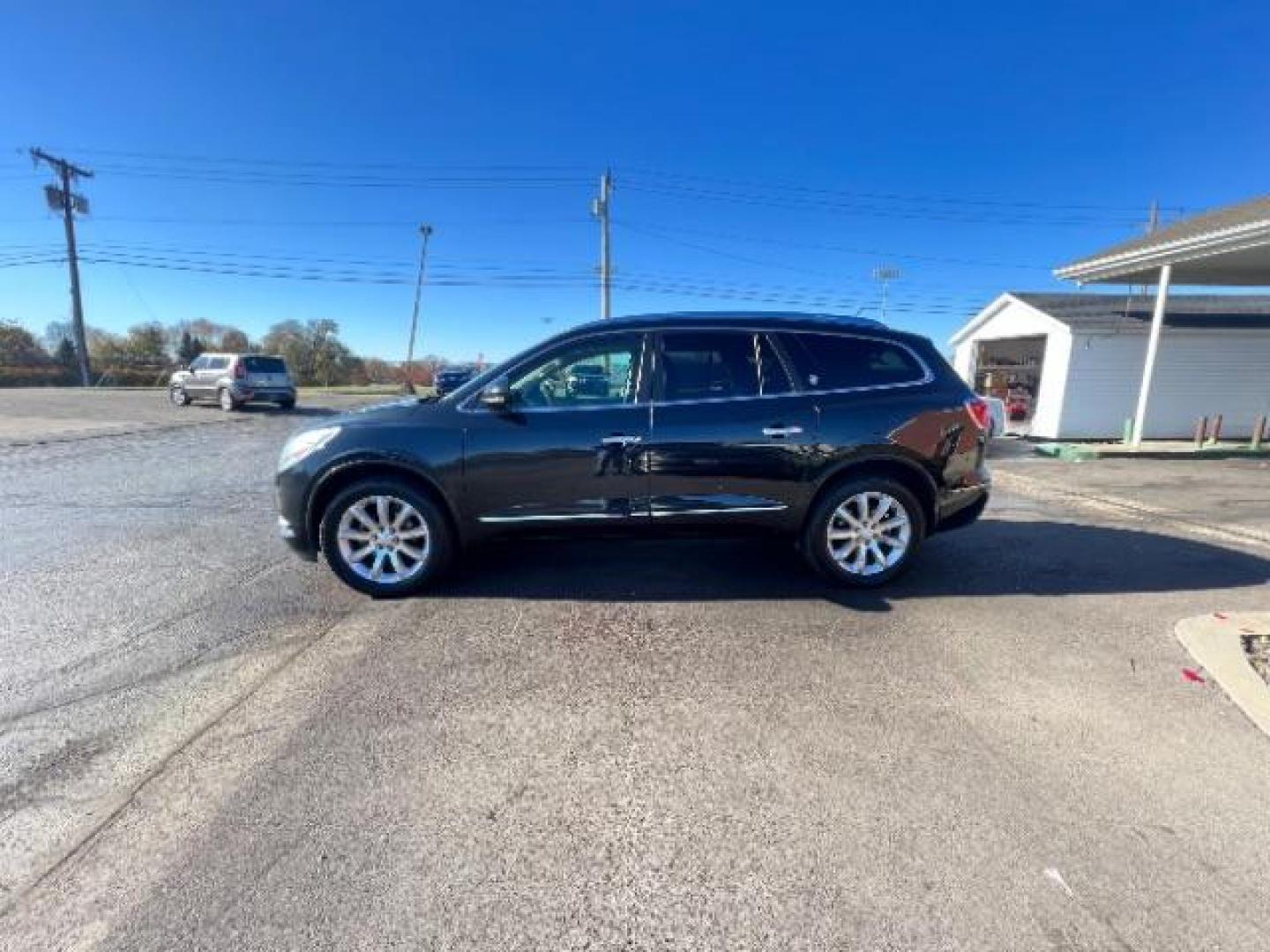 2015 Carbon Black Metallic Buick Enclave Premium FWD (5GAKRCKD4FJ) with an 3.6L V6 DOHC 24V engine, 6-Speed Automatic Overdrive transmission, located at 1099 N County Rd 25A, OH, 45373, (937) 908-9800, 40.057079, -84.212883 - Photo#3