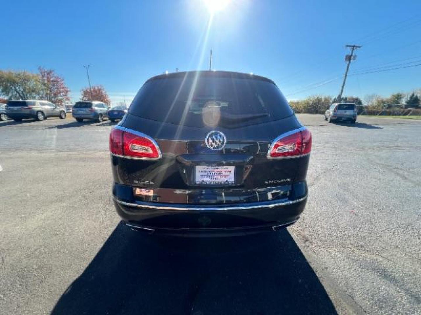 2015 Carbon Black Metallic Buick Enclave Premium FWD (5GAKRCKD4FJ) with an 3.6L V6 DOHC 24V engine, 6-Speed Automatic Overdrive transmission, located at 1099 N County Rd 25A, OH, 45373, (937) 908-9800, 40.057079, -84.212883 - Photo#4