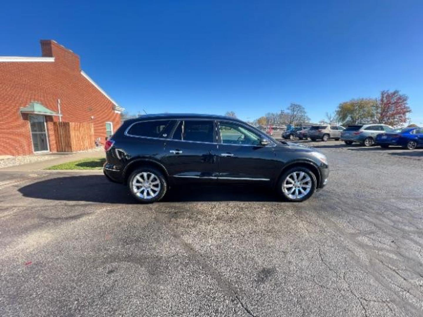 2015 Carbon Black Metallic Buick Enclave Premium FWD (5GAKRCKD4FJ) with an 3.6L V6 DOHC 24V engine, 6-Speed Automatic Overdrive transmission, located at 1099 N County Rd 25A, OH, 45373, (937) 908-9800, 40.057079, -84.212883 - Photo#5