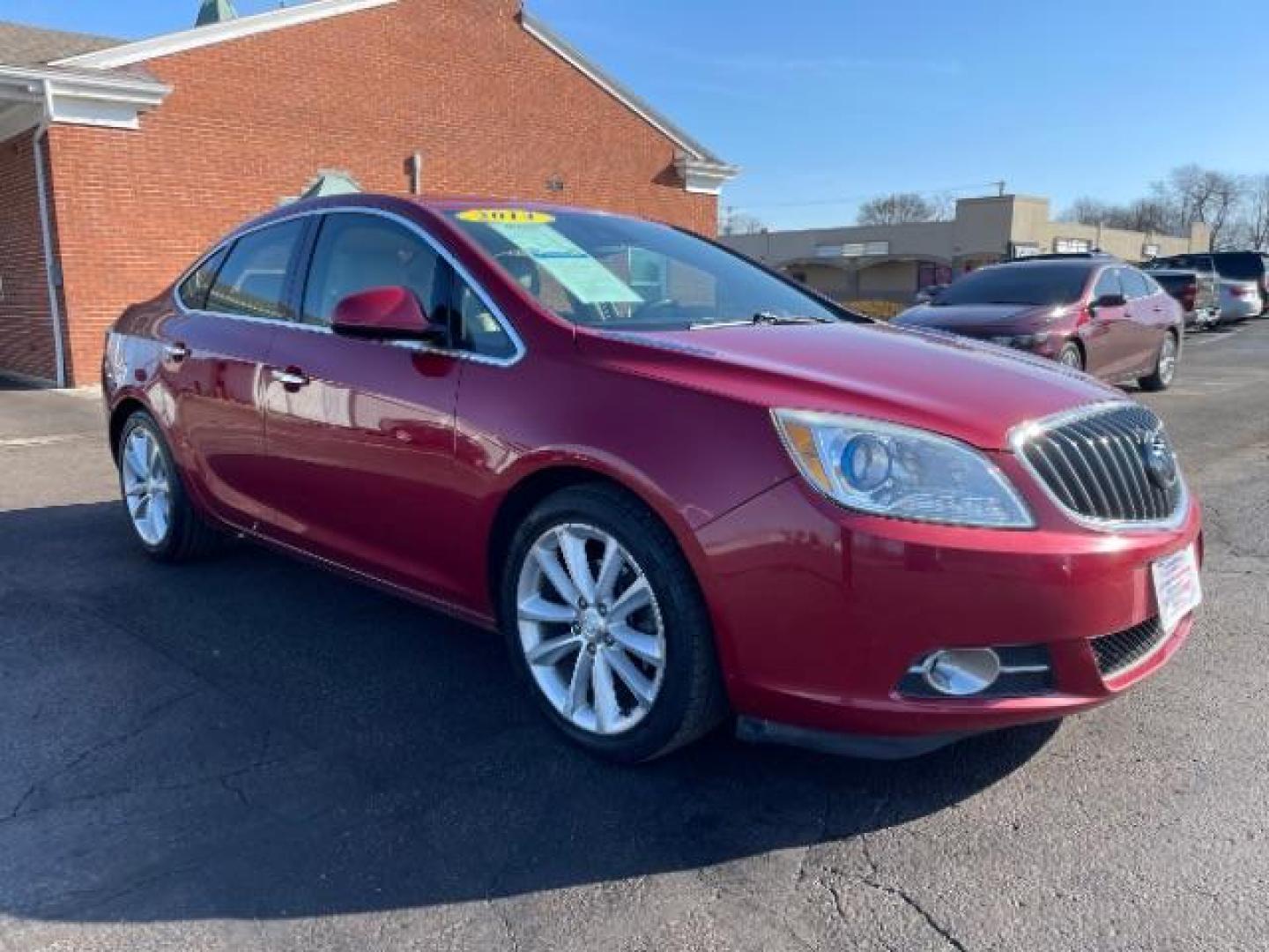 2015 Crystal Red Tintcoat Buick Verano Leather (1G4PS5SK5F4) with an 2.4L L4 DOHC 16V FFV engine, 6-Speed Automatic transmission, located at 1951 S Dayton Lakeview Rd., New Carlisle, OH, 45344, (937) 908-9800, 39.890999, -84.050255 - Photo#0