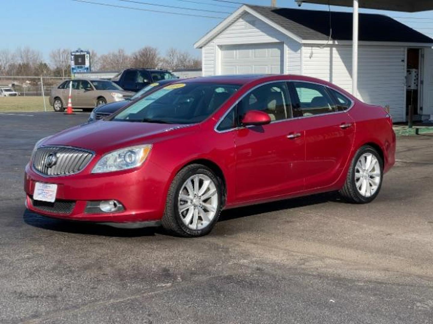 2015 Crystal Red Tintcoat Buick Verano Leather (1G4PS5SK5F4) with an 2.4L L4 DOHC 16V FFV engine, 6-Speed Automatic transmission, located at 1951 S Dayton Lakeview Rd., New Carlisle, OH, 45344, (937) 908-9800, 39.890999, -84.050255 - Photo#1