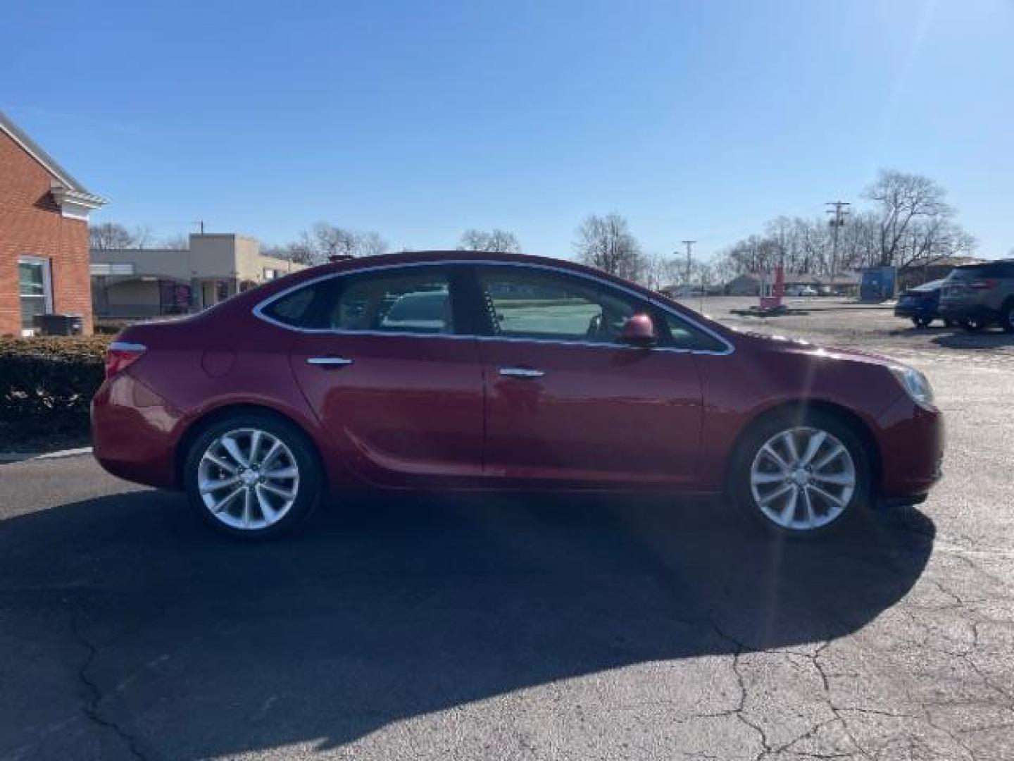 2015 Crystal Red Tintcoat Buick Verano Leather (1G4PS5SK5F4) with an 2.4L L4 DOHC 16V FFV engine, 6-Speed Automatic transmission, located at 1951 S Dayton Lakeview Rd., New Carlisle, OH, 45344, (937) 908-9800, 39.890999, -84.050255 - Photo#3