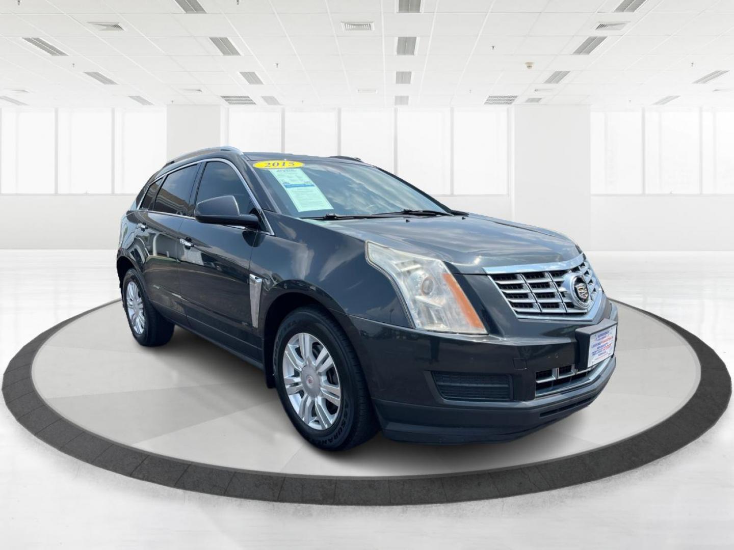 2015 Graphite Metallic Cadillac SRX Luxury Collection AWD (3GYFNEE31FS) with an 3.6L V6 DOHC 24V FFV engine, 6-Speed Automatic transmission, located at 1099 N County Rd 25A, OH, 45373, (937) 908-9800, 40.057079, -84.212883 - Photo#0