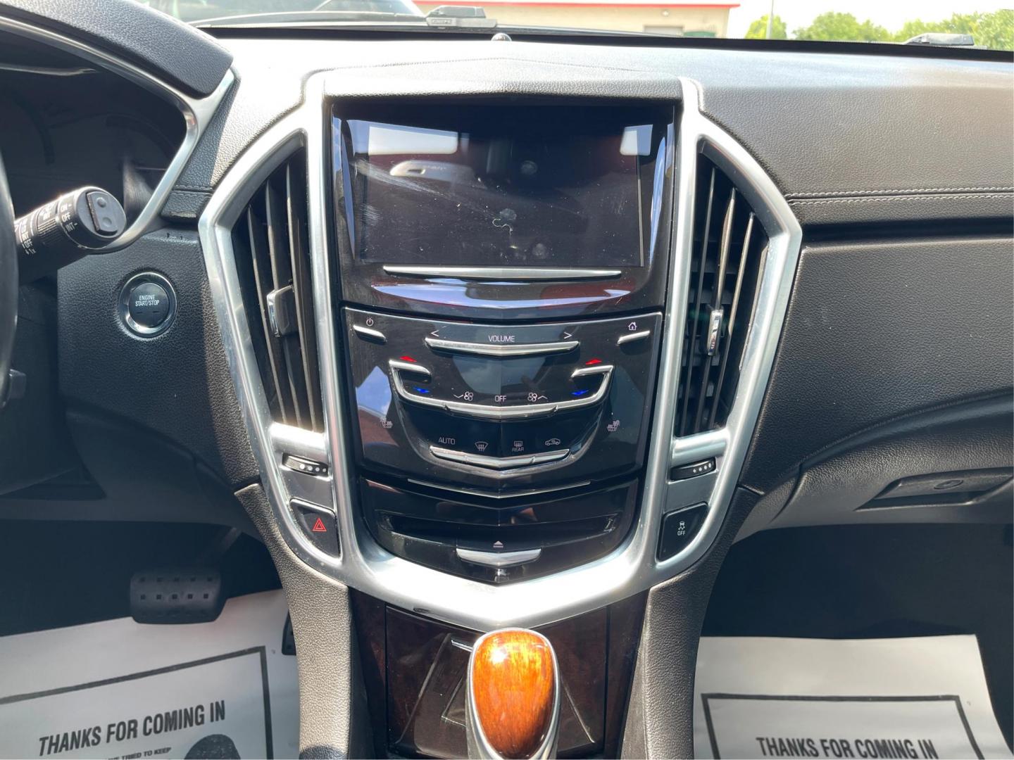 2015 Graphite Metallic Cadillac SRX Luxury Collection AWD (3GYFNEE31FS) with an 3.6L V6 DOHC 24V FFV engine, 6-Speed Automatic transmission, located at 1099 N County Rd 25A, OH, 45373, (937) 908-9800, 40.057079, -84.212883 - Photo#12