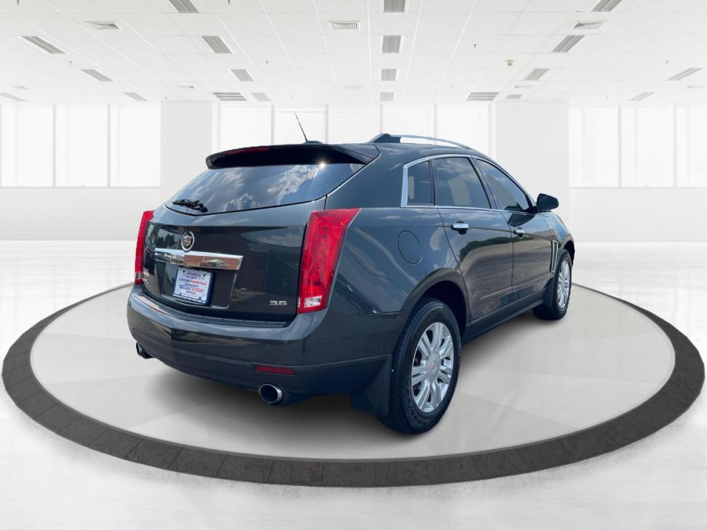 2015 Graphite Metallic Cadillac SRX Luxury Collection AWD (3GYFNEE31FS) with an 3.6L V6 DOHC 24V FFV engine, 6-Speed Automatic transmission, located at 1099 N County Rd 25A, OH, 45373, (937) 908-9800, 40.057079, -84.212883 - Photo#2