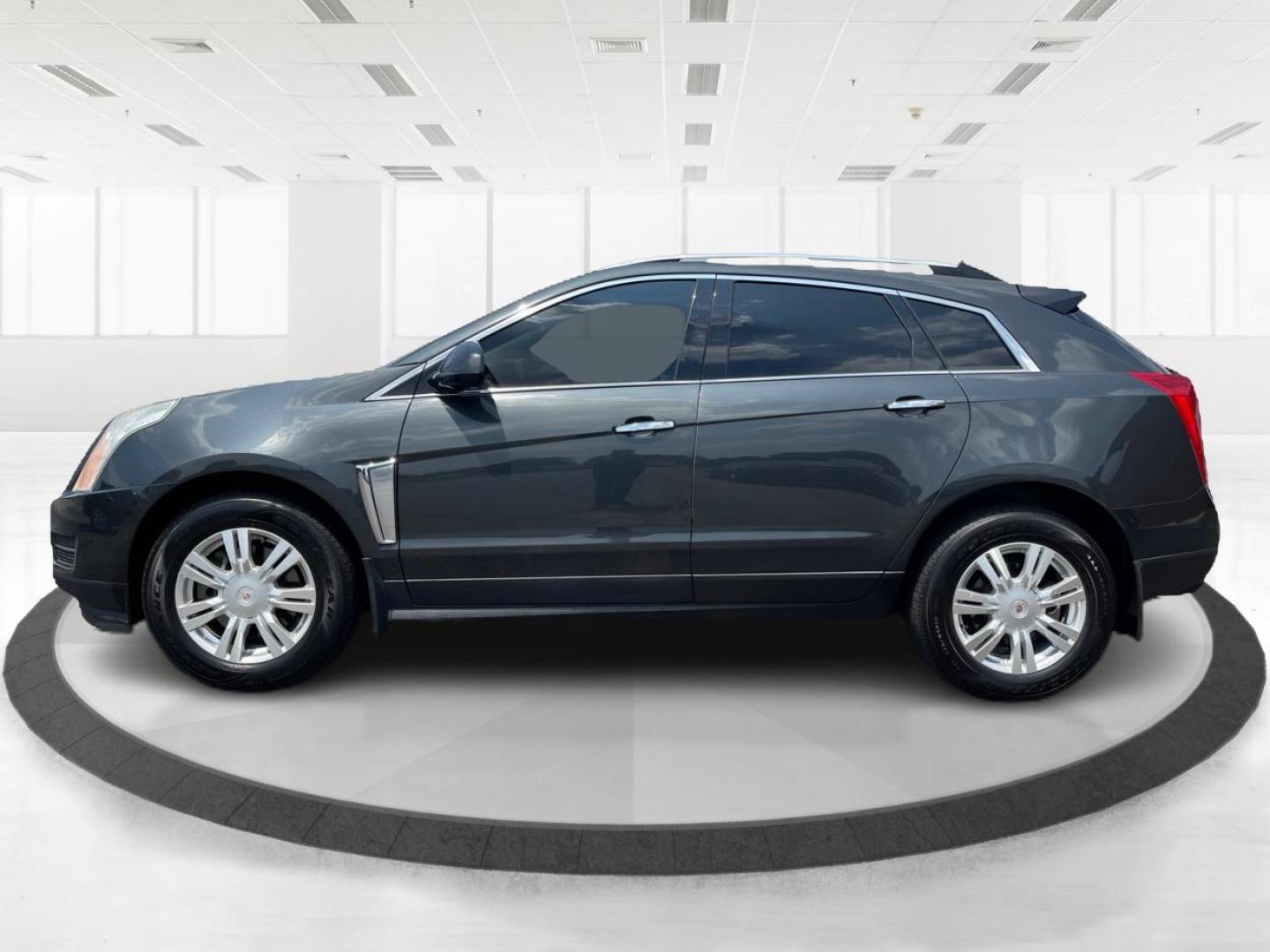 2015 Graphite Metallic Cadillac SRX Luxury Collection AWD (3GYFNEE31FS) with an 3.6L V6 DOHC 24V FFV engine, 6-Speed Automatic transmission, located at 1099 N County Rd 25A, OH, 45373, (937) 908-9800, 40.057079, -84.212883 - Photo#5