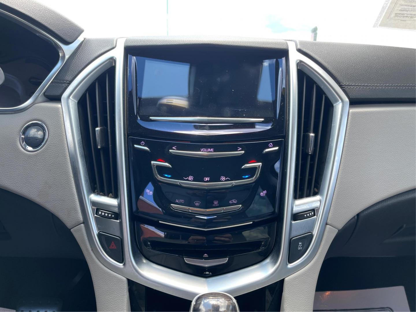 2015 Platinum Ice Tricoat Cadillac SRX (3GYFNBE38FS) with an 3.6L V6 DOHC 24V FFV engine, 6-Speed Automatic transmission, located at 880 E. National Road, Vandalia, OH, 45377, (937) 908-9800, 39.892189, -84.181015 - Photo#12