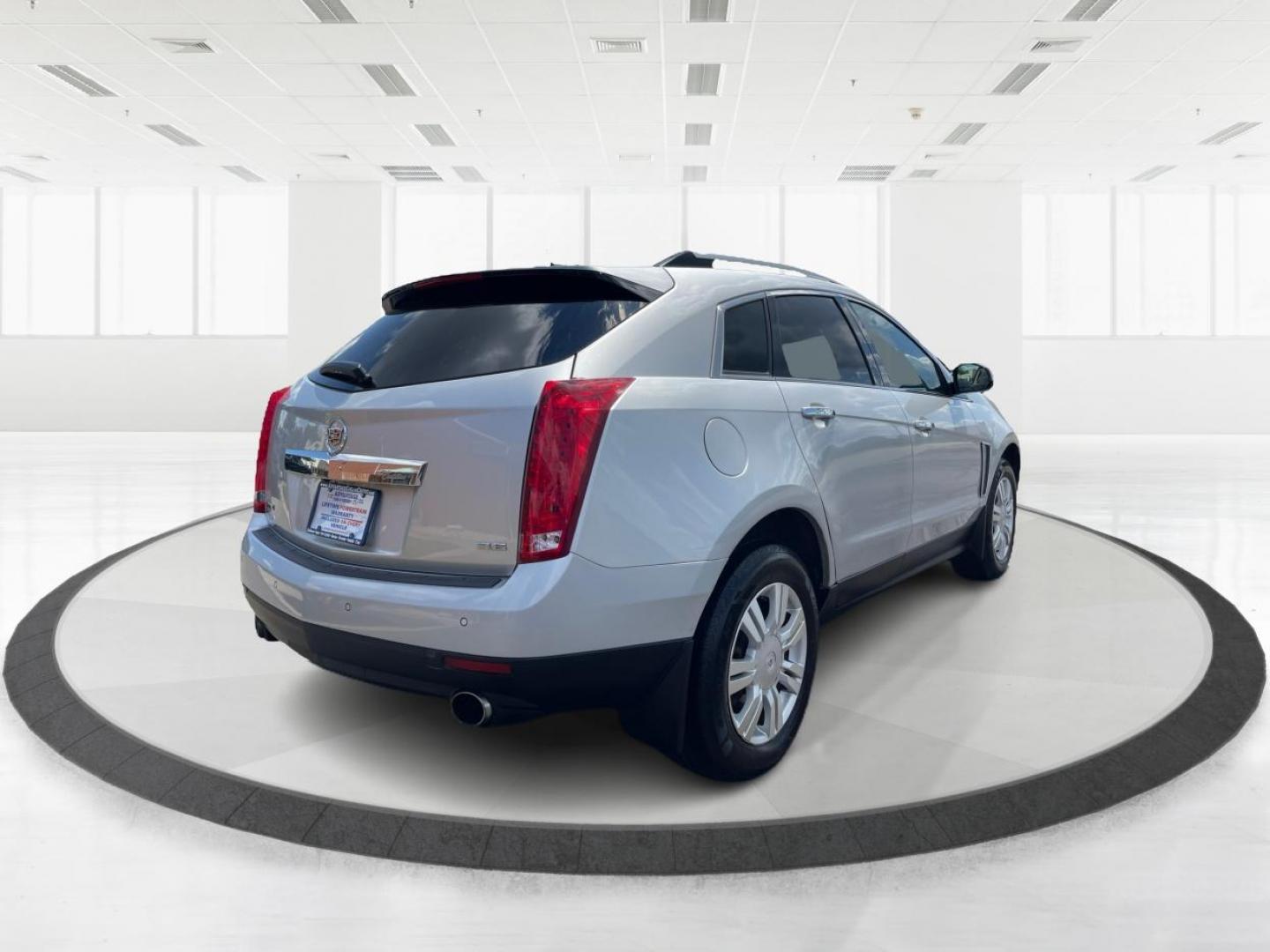 2015 Platinum Ice Tricoat Cadillac SRX (3GYFNBE38FS) with an 3.6L V6 DOHC 24V FFV engine, 6-Speed Automatic transmission, located at 880 E. National Road, Vandalia, OH, 45377, (937) 908-9800, 39.892189, -84.181015 - Photo#2