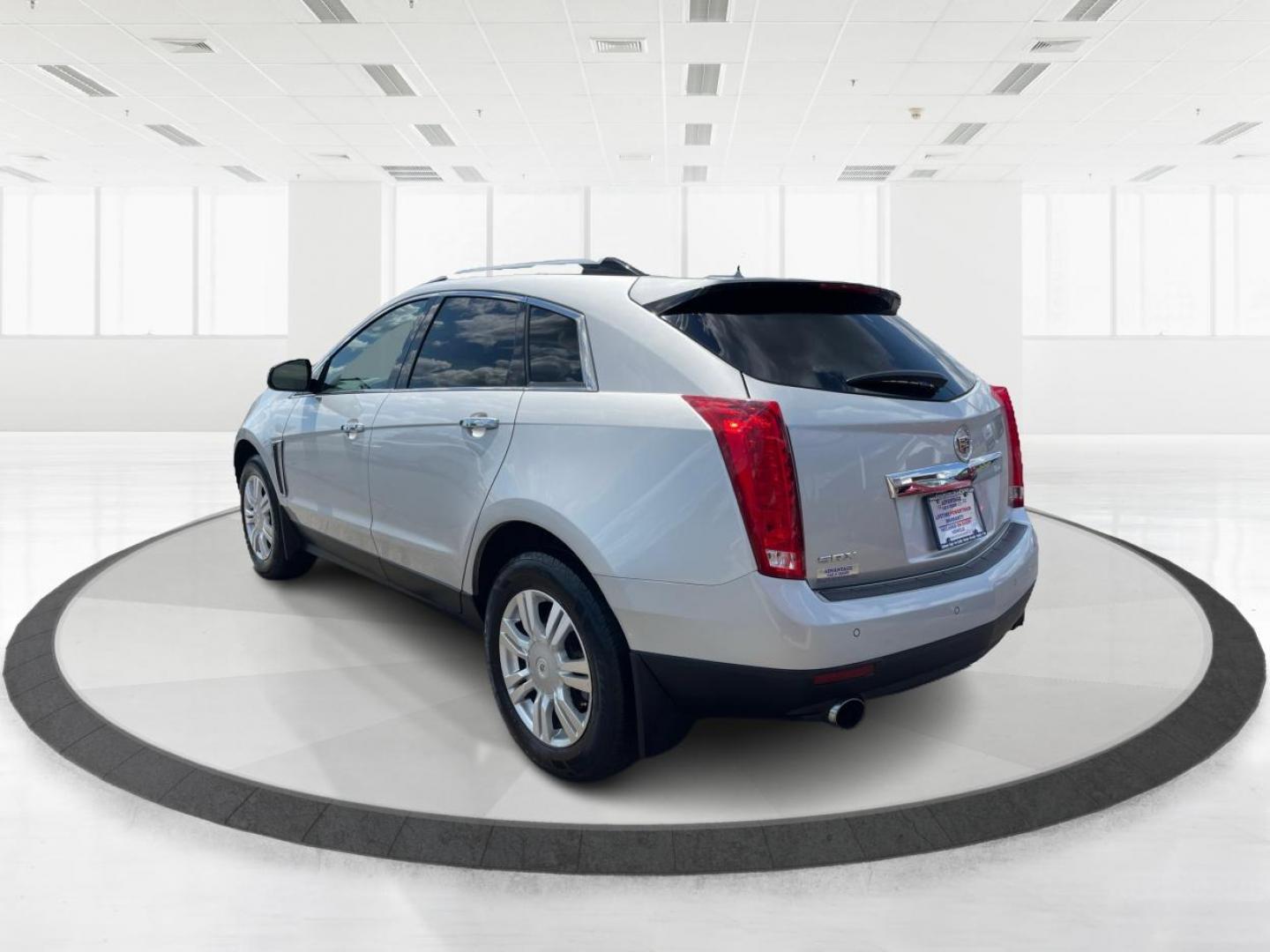 2015 Platinum Ice Tricoat Cadillac SRX (3GYFNBE38FS) with an 3.6L V6 DOHC 24V FFV engine, 6-Speed Automatic transmission, located at 880 E. National Road, Vandalia, OH, 45377, (937) 908-9800, 39.892189, -84.181015 - Photo#4