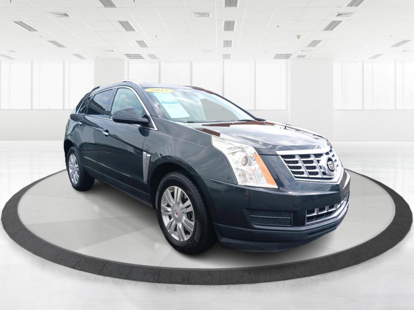 2015 Graphite Metallic Cadillac SRX Luxury Collection FWD (3GYFNBE3XFS) with an 3.6L V6 DOHC 24V FFV engine, 6-Speed Automatic transmission, located at 1184 Kauffman Ave, Fairborn, OH, 45324, (937) 908-9800, 39.807365, -84.029114 - Photo#0