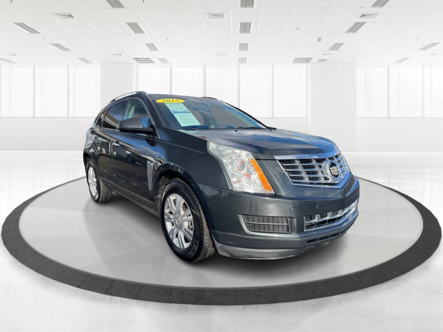 2015 Graphite Metallic Cadillac SRX Luxury Collection FWD (3GYFNBE3XFS) with an 3.6L V6 DOHC 24V FFV engine, 6-Speed Automatic transmission, located at 880 E. National Road, Vandalia, OH, 45377, (937) 908-9800, 39.891918, -84.183594 - 2015 Cadillac SRX Luxury Collection FWD - Photo#0