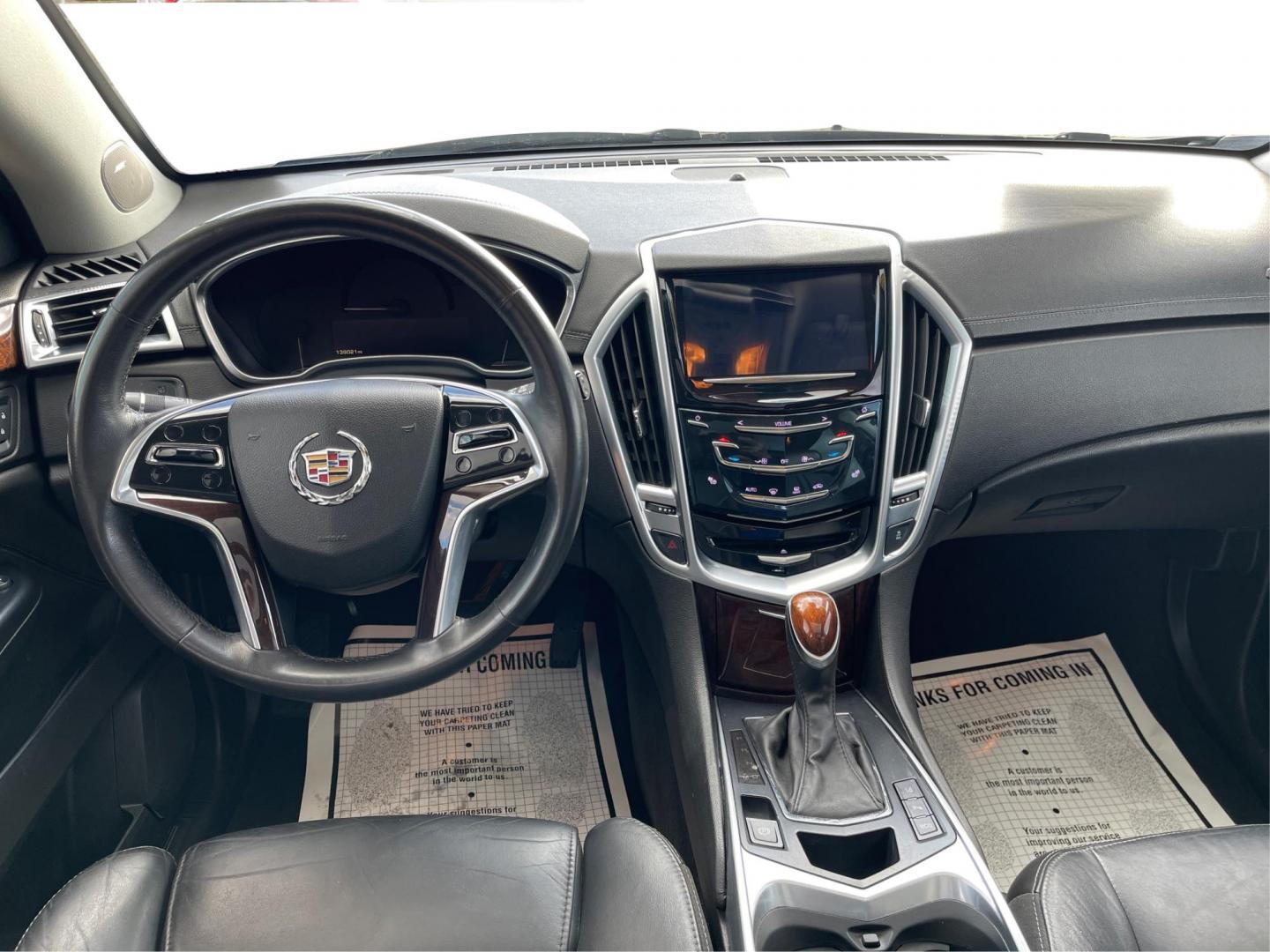 2015 Graphite Metallic Cadillac SRX Luxury Collection FWD (3GYFNBE3XFS) with an 3.6L V6 DOHC 24V FFV engine, 6-Speed Automatic transmission, located at 880 E. National Road, Vandalia, OH, 45377, (937) 908-9800, 39.891918, -84.183594 - 2015 Cadillac SRX Luxury Collection FWD - Photo#20