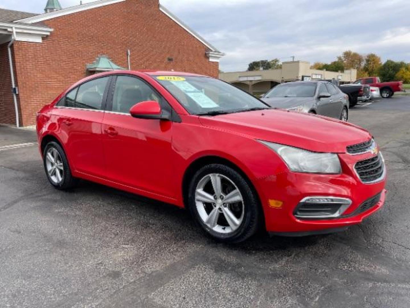 2015 Red Hot Chevrolet Cruze 2LT Auto (1G1PE5SB2F7) with an 1.4L L4 DOHC 16V TURBO engine, 6-Speed Automatic transmission, located at 1951 S Dayton Lakeview Rd., New Carlisle, OH, 45344, (937) 908-9800, 39.890999, -84.050255 - Photo#0