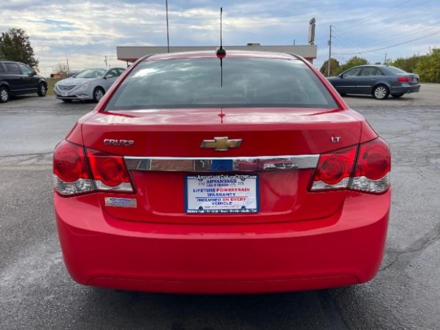 2015 Red Hot Chevrolet Cruze 2LT Auto (1G1PE5SB2F7) with an 1.4L L4 DOHC 16V TURBO engine, 6-Speed Automatic transmission, located at 1951 S Dayton Lakeview Rd., New Carlisle, OH, 45344, (937) 908-9800, 39.890999, -84.050255 - Photo#4