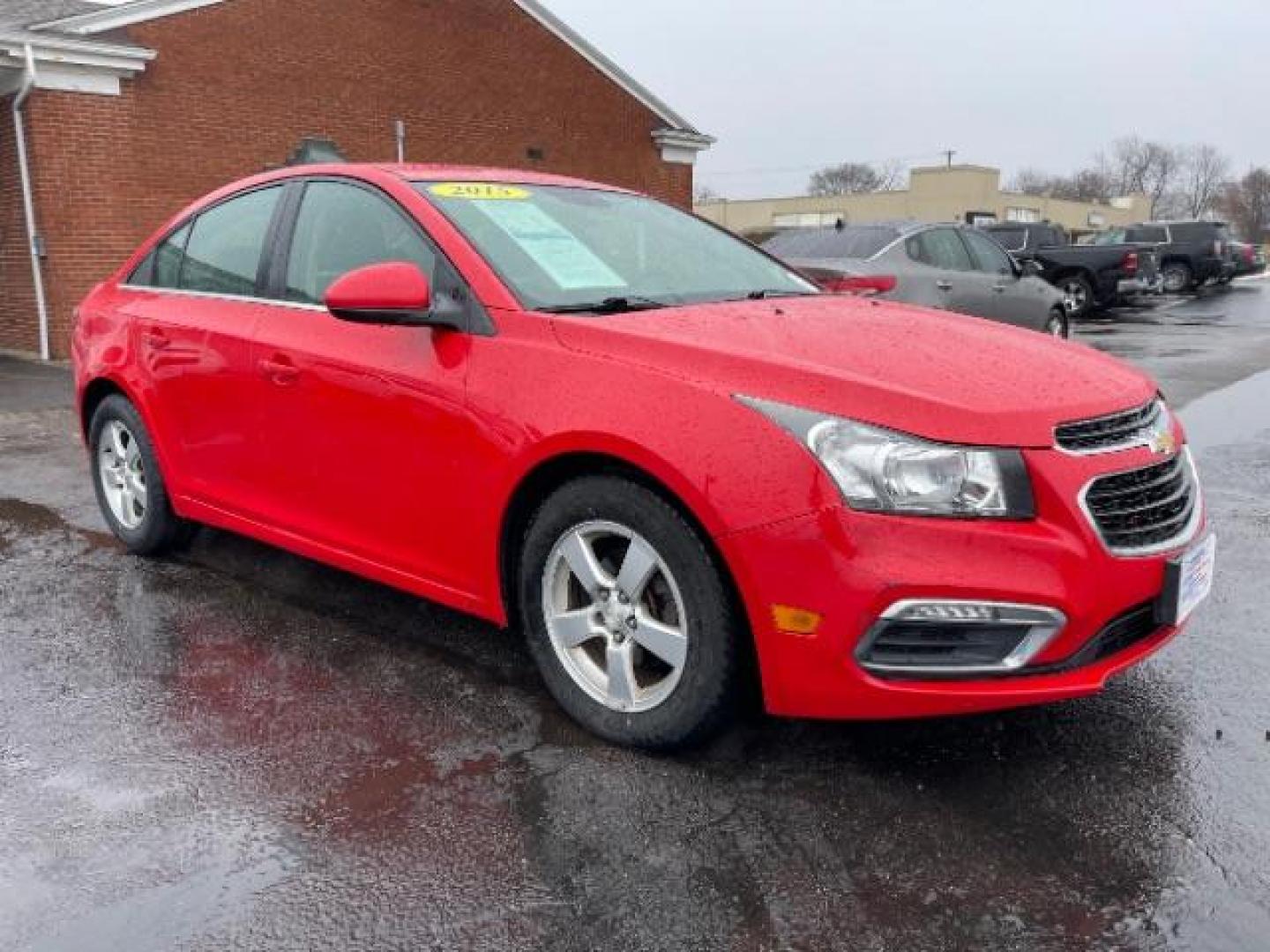 2015 Red Hot Chevrolet Cruze 1LT Auto (1G1PC5SB5F7) with an 1.4L L4 DOHC 16V TURBO engine, 6-Speed Automatic transmission, located at 1951 S Dayton Lakeview Rd., New Carlisle, OH, 45344, (937) 908-9800, 39.890999, -84.050255 - Photo#0